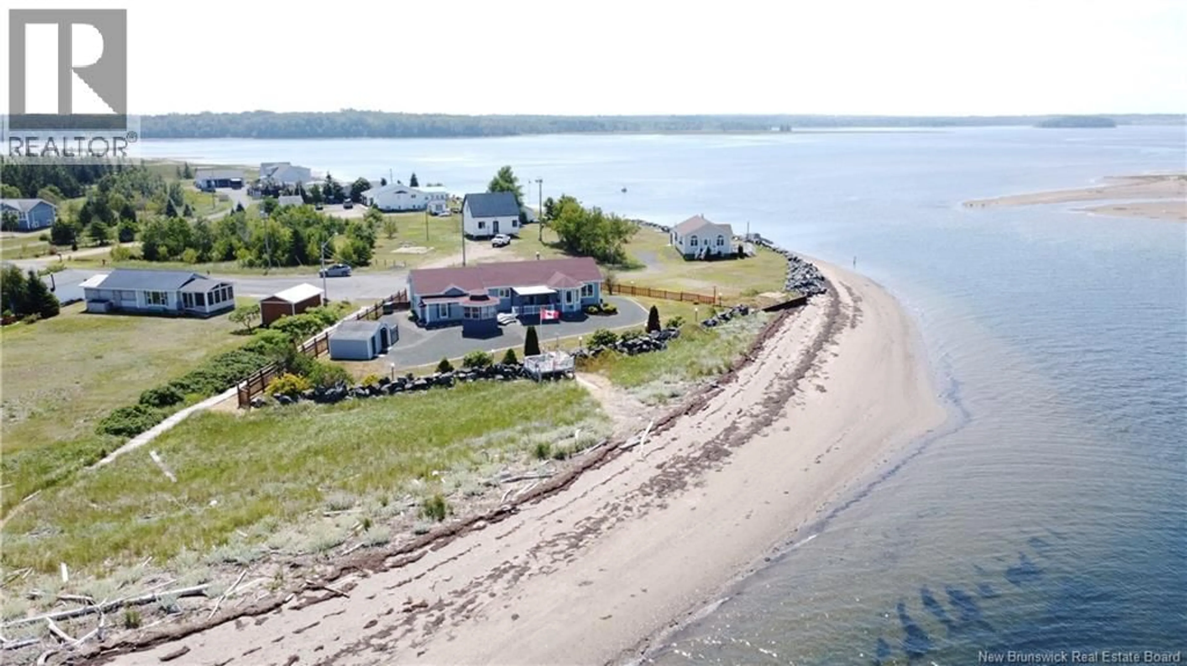 A pic from outside/outdoor area/front of a property/back of a property/a pic from drone, water/lake/river/ocean view for 25 BAYSHORE, Bathurst New Brunswick E2A6A4
