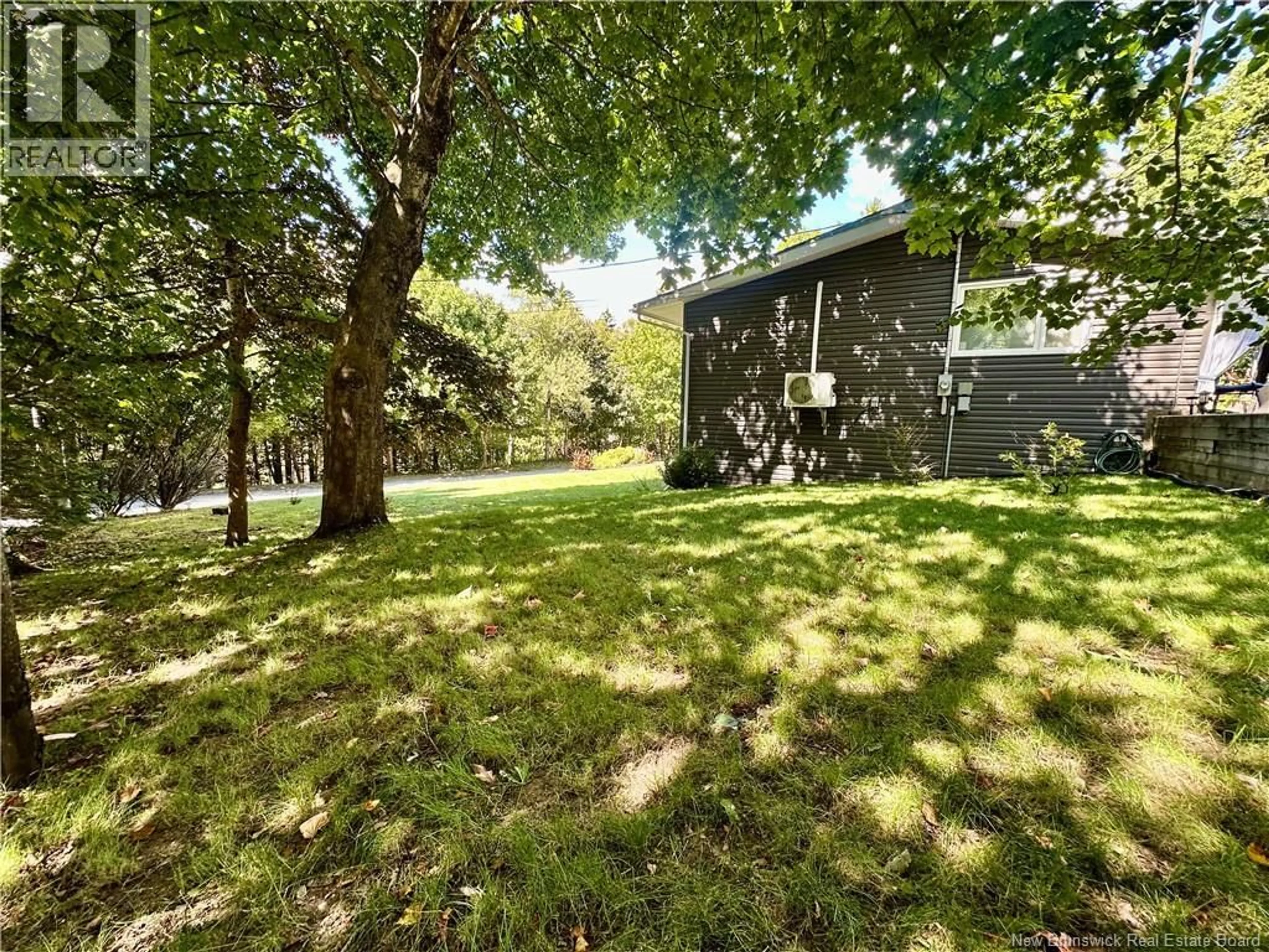 A pic from outside/outdoor area/front of a property/back of a property/a pic from drone, forest/trees view for 829 EDGEHILL ROW, Saint John New Brunswick E2M4G6