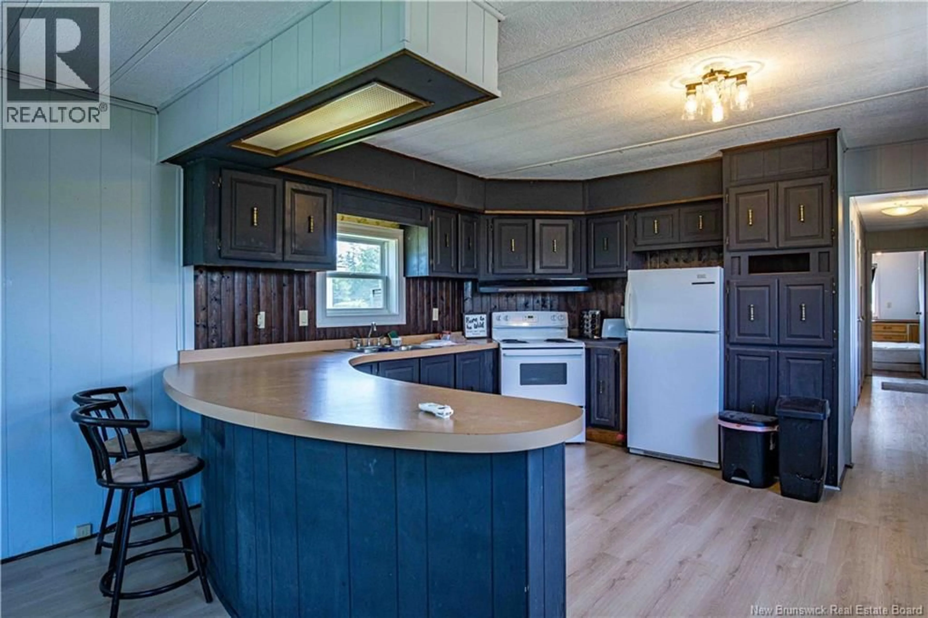 Open concept kitchen, wood/laminate floor for 423 ROUTE 105, Maugerville New Brunswick E3A8N3