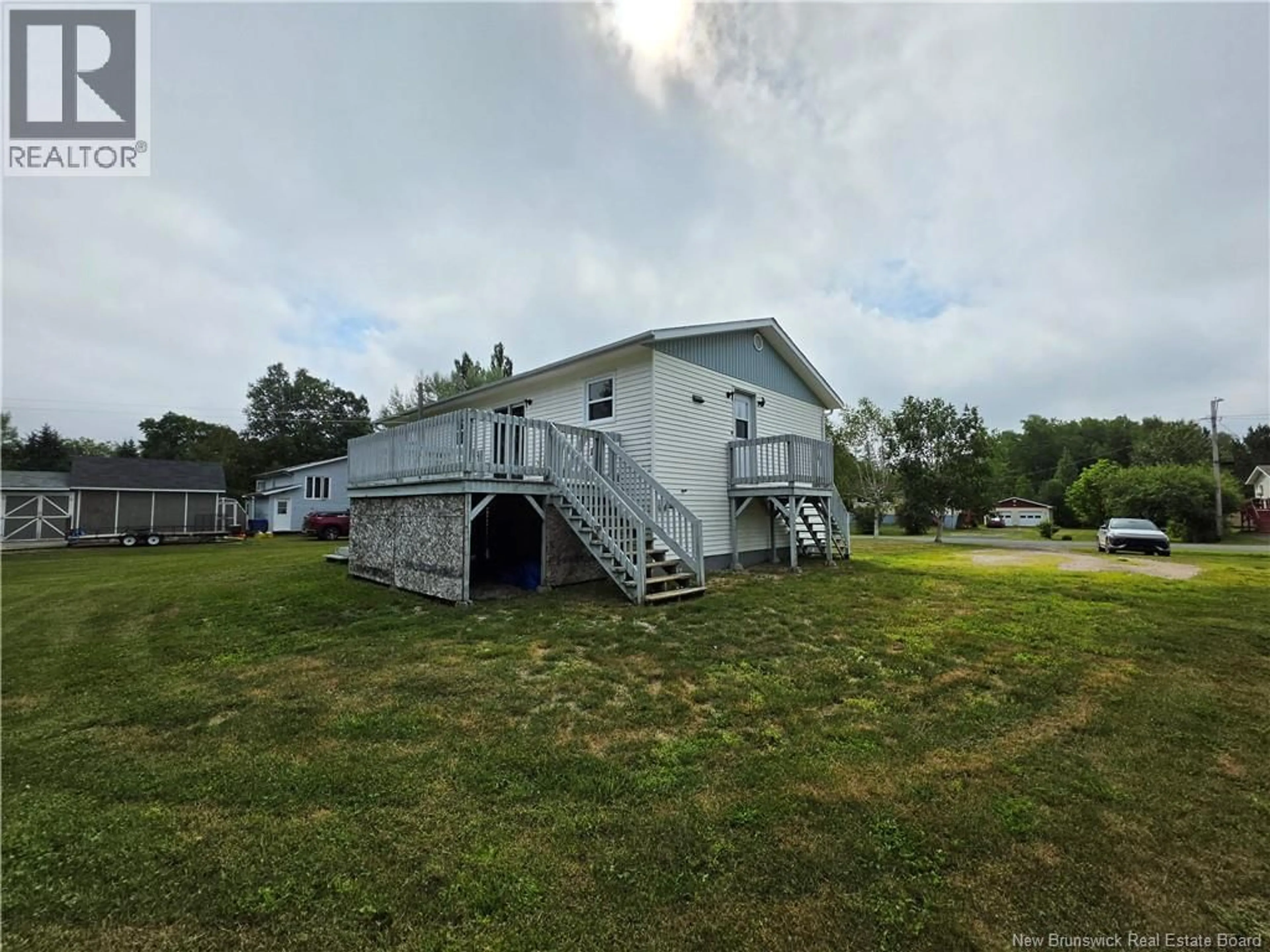 A pic from outside/outdoor area/front of a property/back of a property/a pic from drone, water/lake/river/ocean view for 1800 CORMIER, Robertville New Brunswick E8K2T9