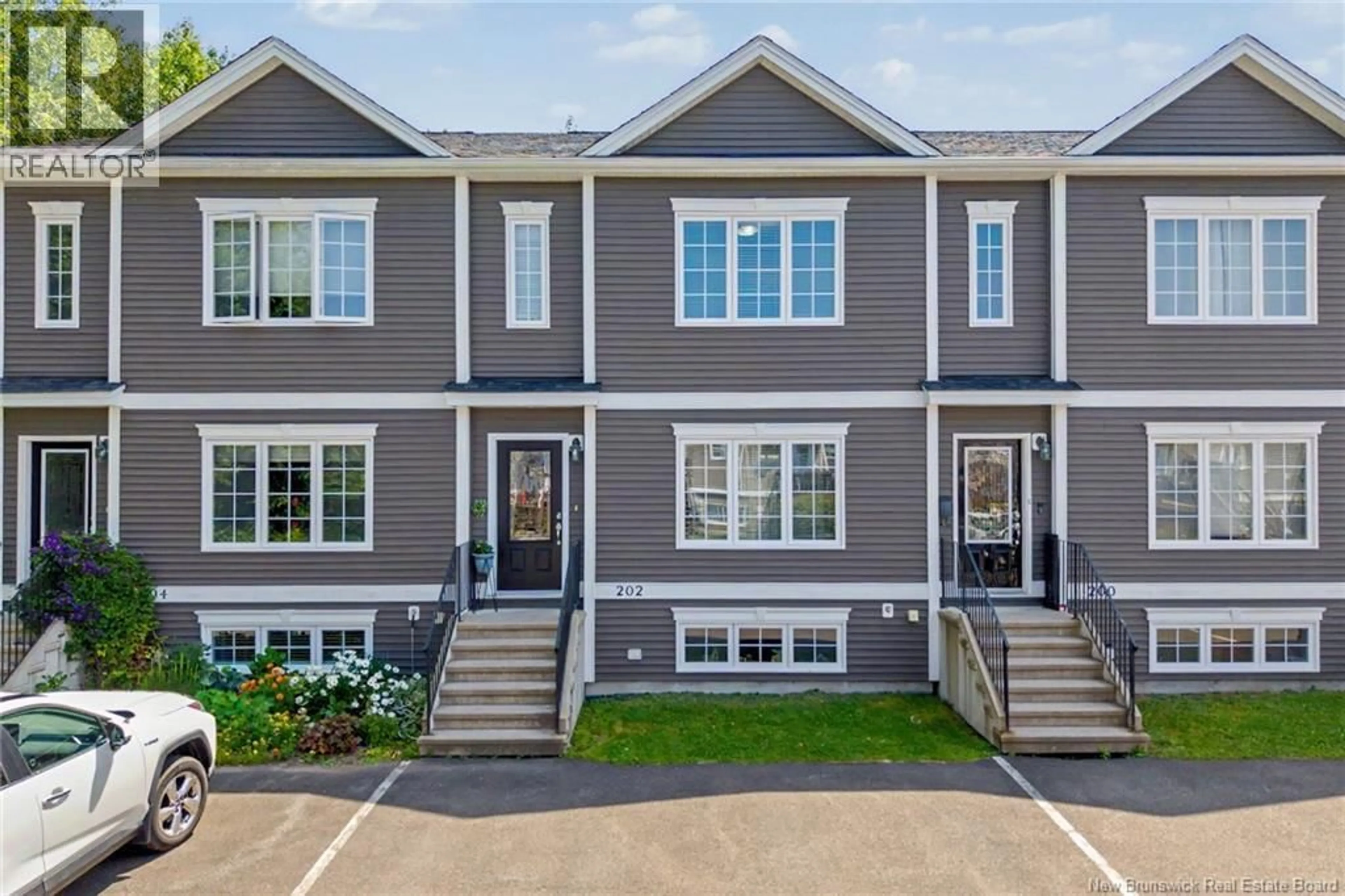 Home with vinyl exterior material, street for 202 JAMES STREET, Fredericton New Brunswick E3G0N8