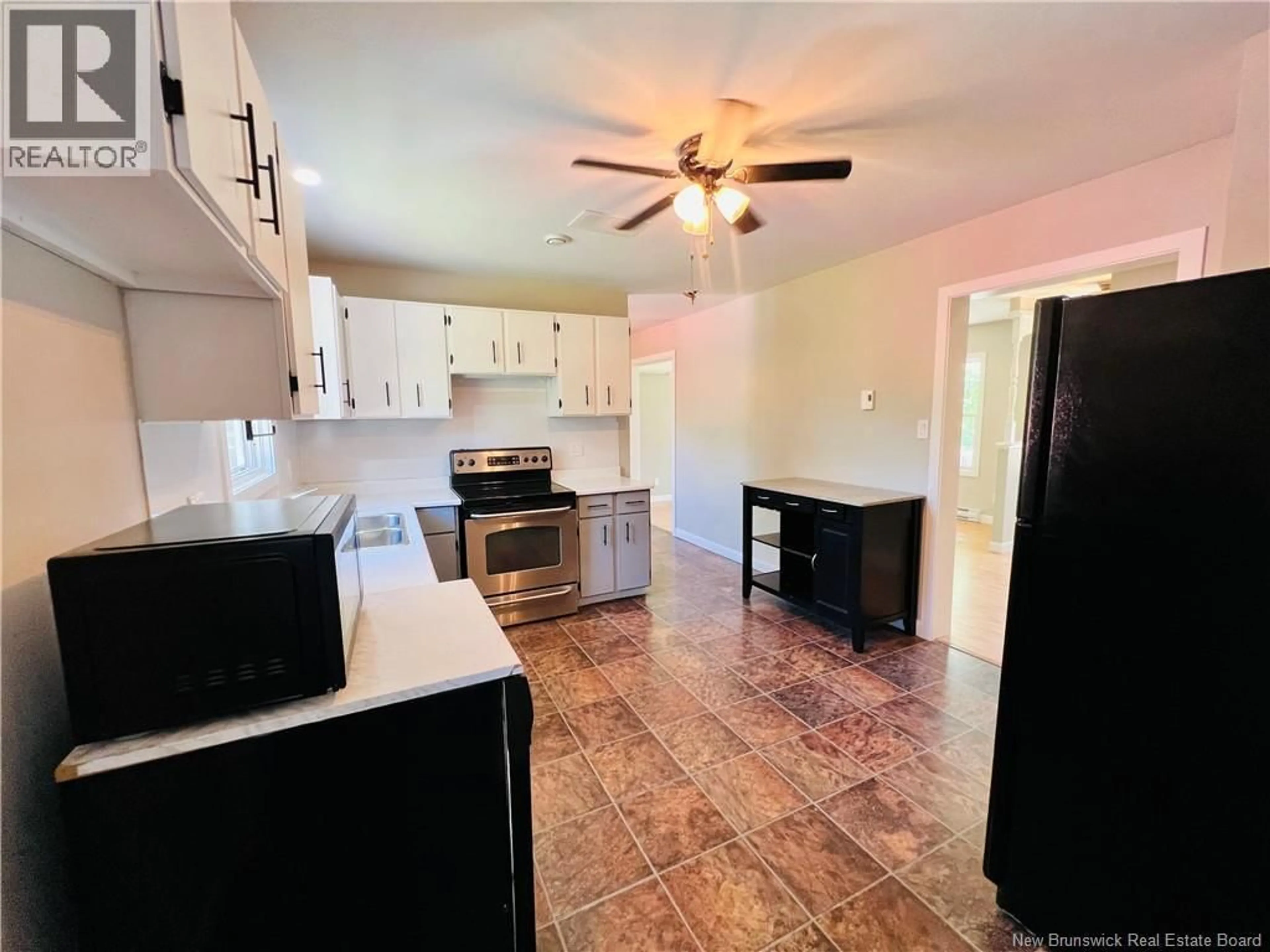 Open concept kitchen, ceramic/tile floor for 179 UNION STREET, St. Stephen New Brunswick E3L1W2