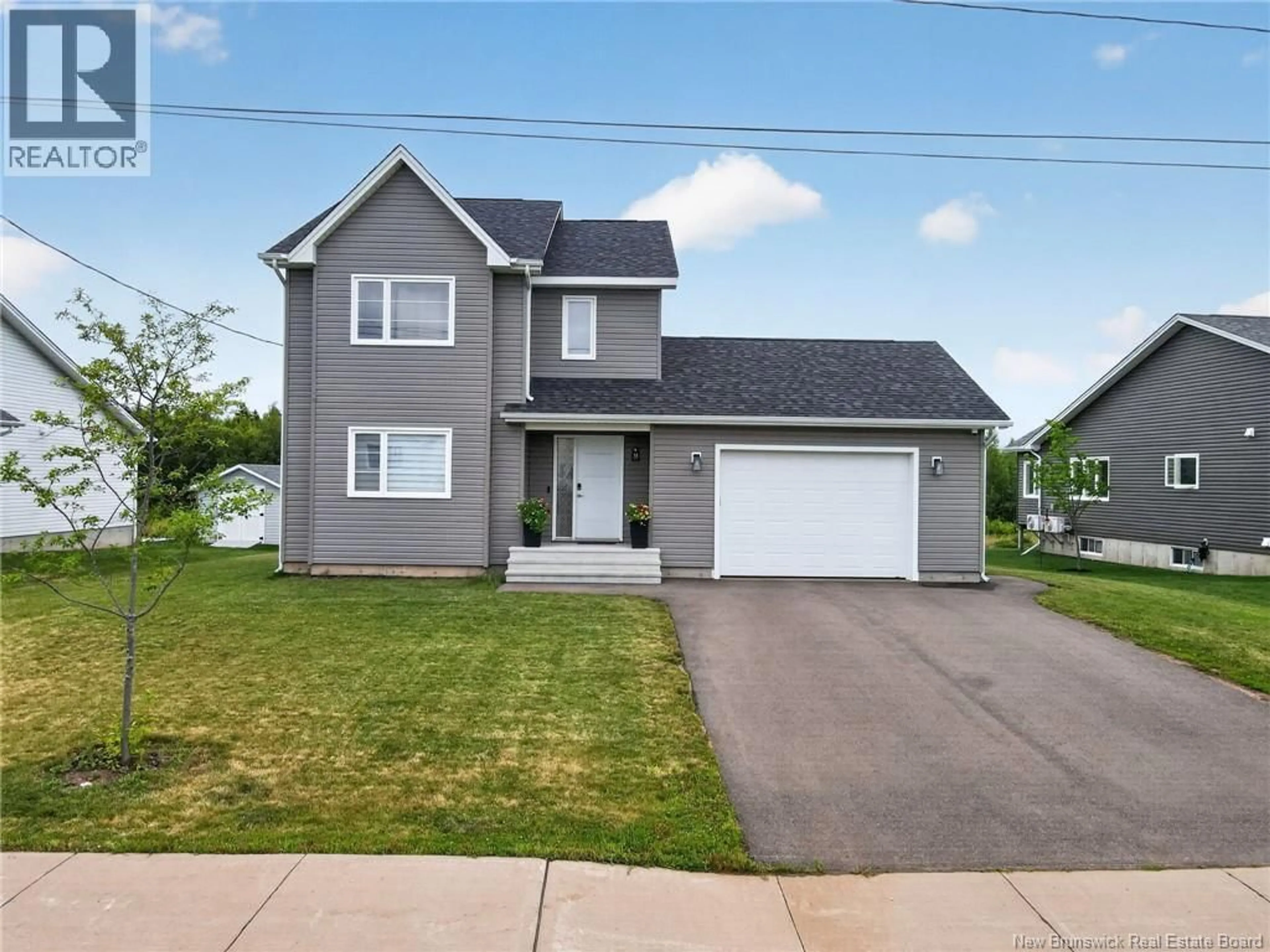 Home with vinyl exterior material, street for 32 LUXOR DRIVE, Riverview New Brunswick E1B0V8