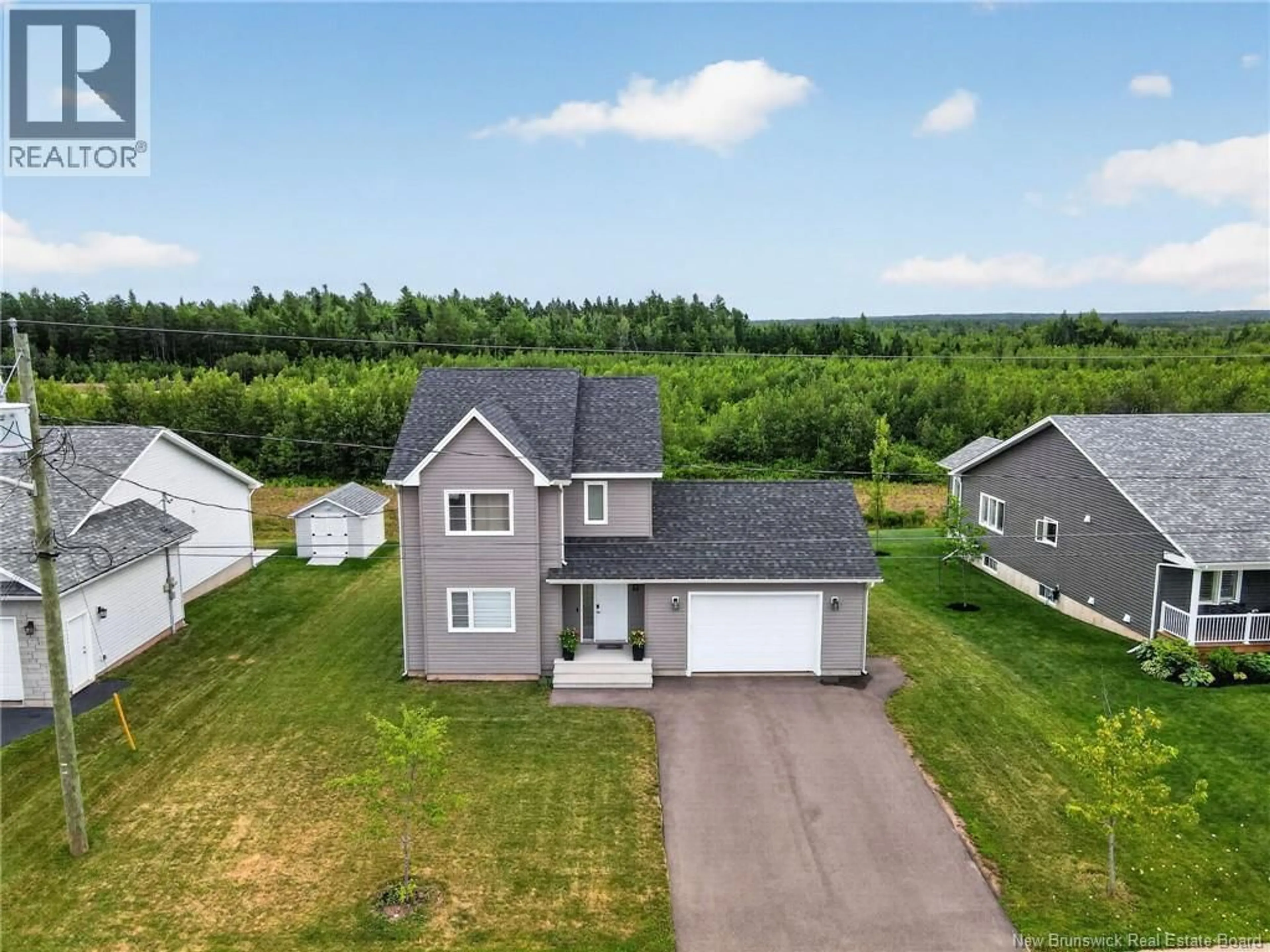 A pic from outside/outdoor area/front of a property/back of a property/a pic from drone, unknown for 32 LUXOR DRIVE, Riverview New Brunswick E1B0V8