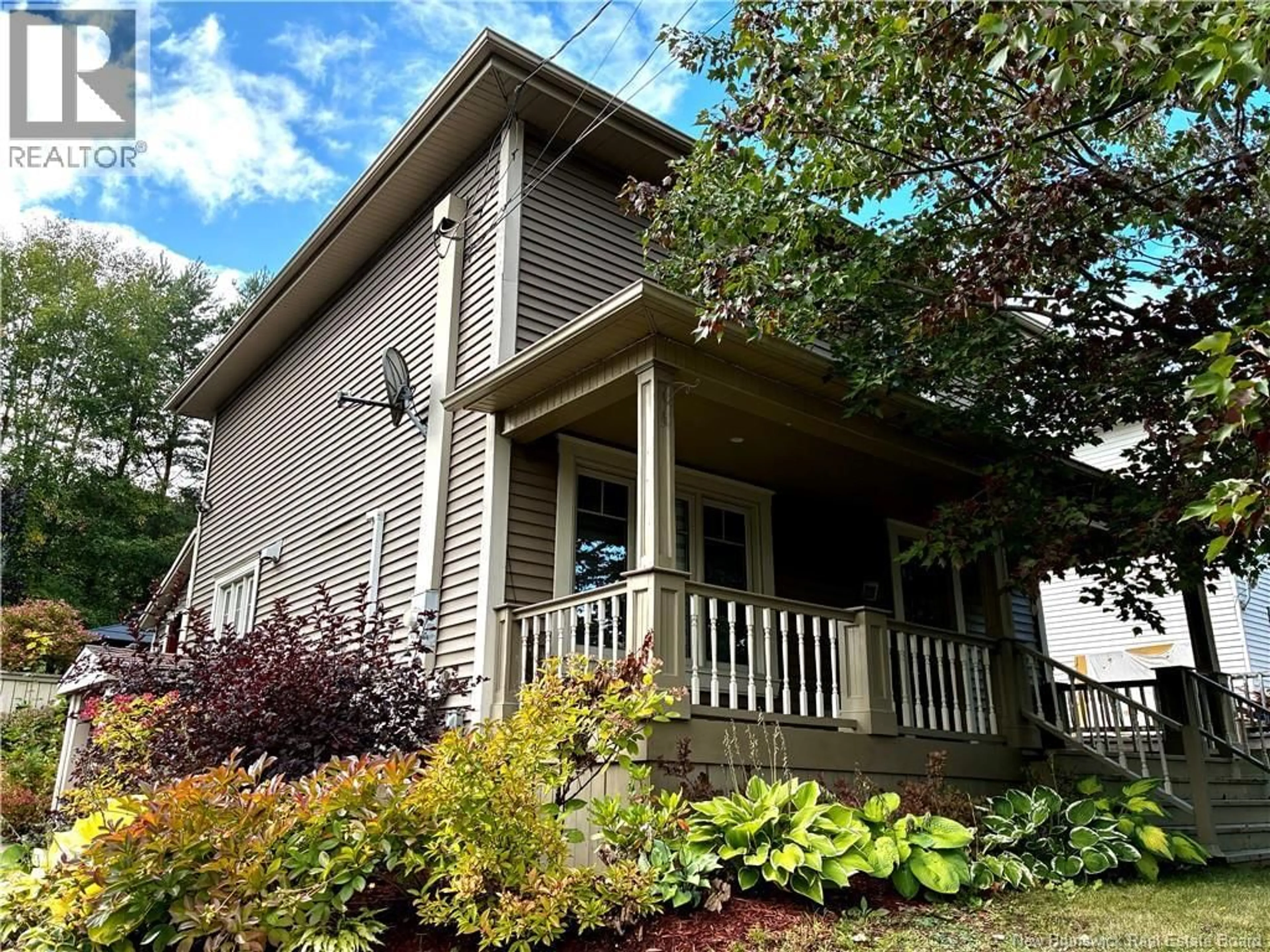 Home with vinyl exterior material, street for 22 21E AVENUE, Edmundston New Brunswick E3V2B9