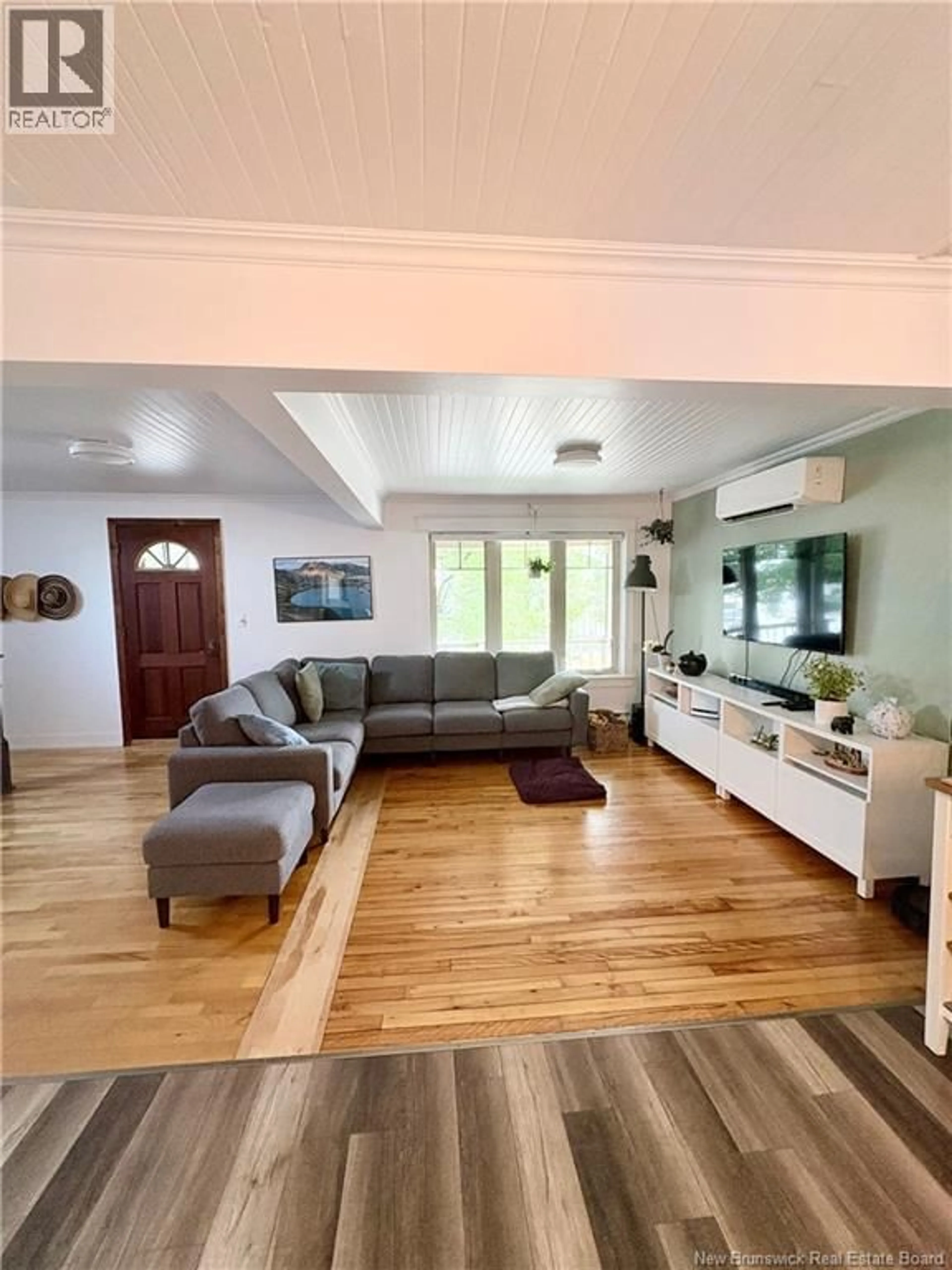 Living room with furniture, unknown for 22 21E AVENUE, Edmundston New Brunswick E3V2B9