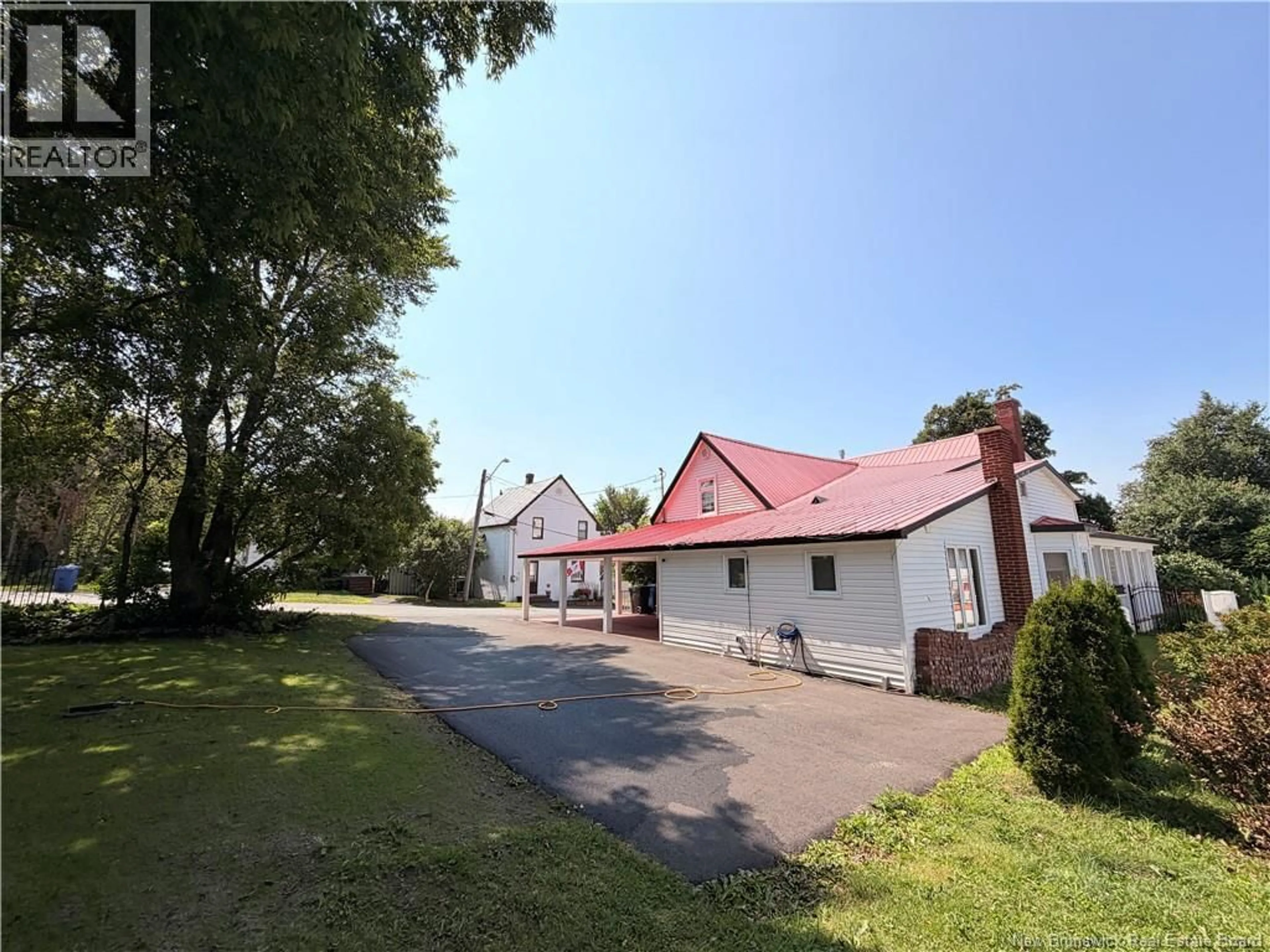 A pic from outside/outdoor area/front of a property/back of a property/a pic from drone, unknown for 1512 WATER STREET, Miramichi New Brunswick E1N1A6
