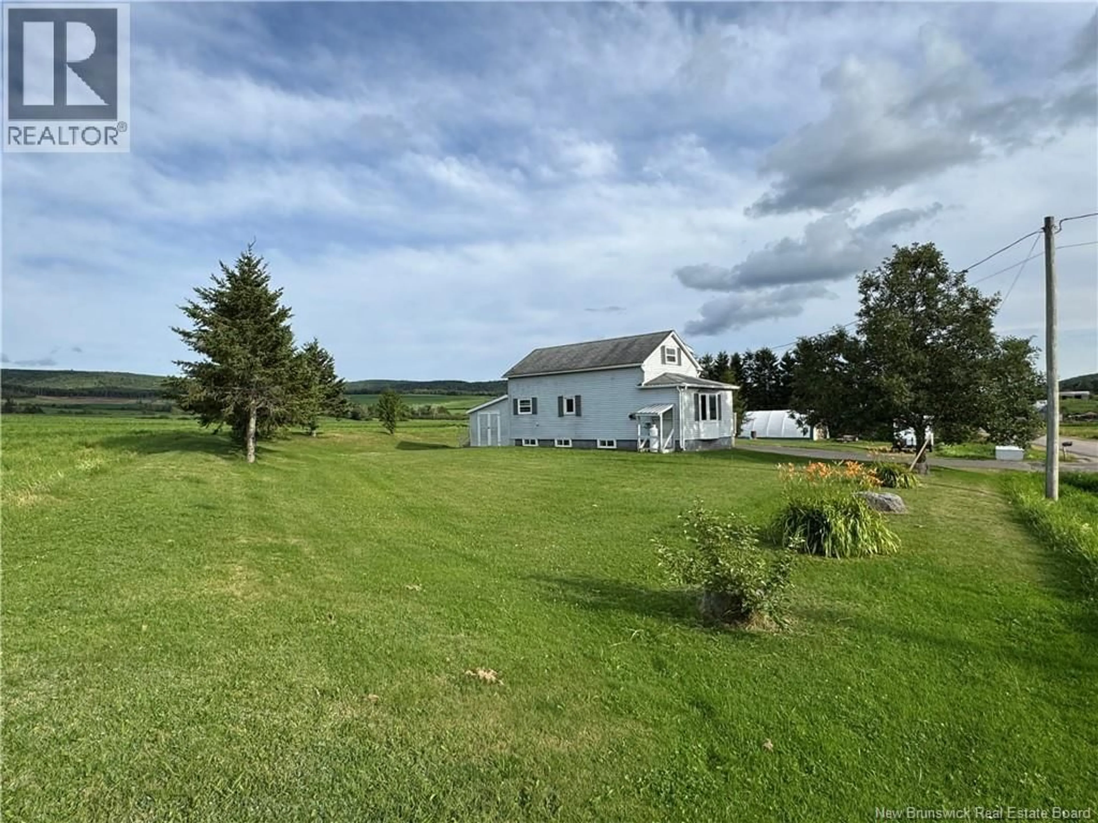 A pic from outside/outdoor area/front of a property/back of a property/a pic from drone, water/lake/river/ocean view for 6718 ROUTE 111, New Line Road New Brunswick E4E4S5