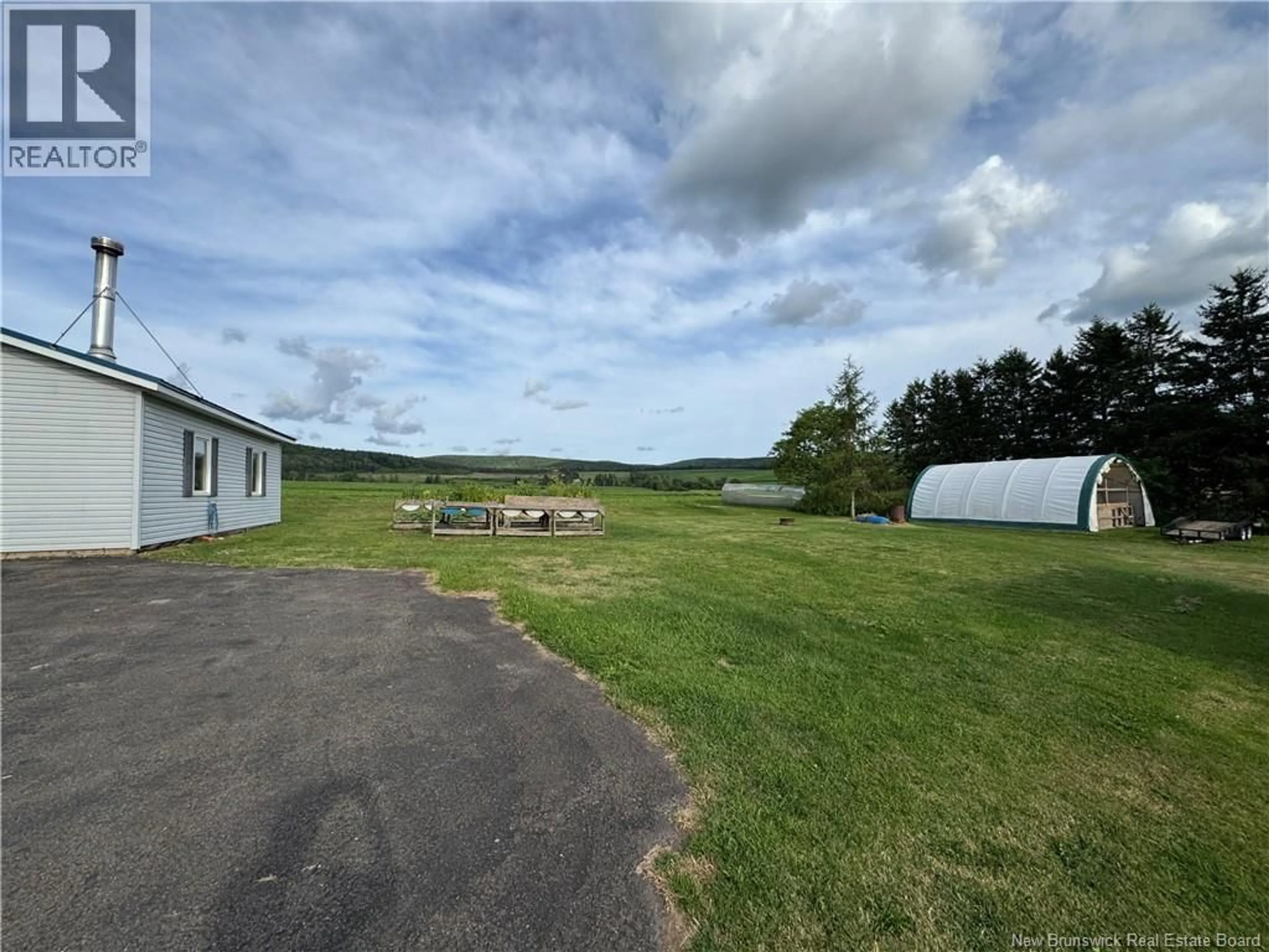 A pic from outside/outdoor area/front of a property/back of a property/a pic from drone, unknown for 6718 ROUTE 111, New Line Road New Brunswick E4E4S5
