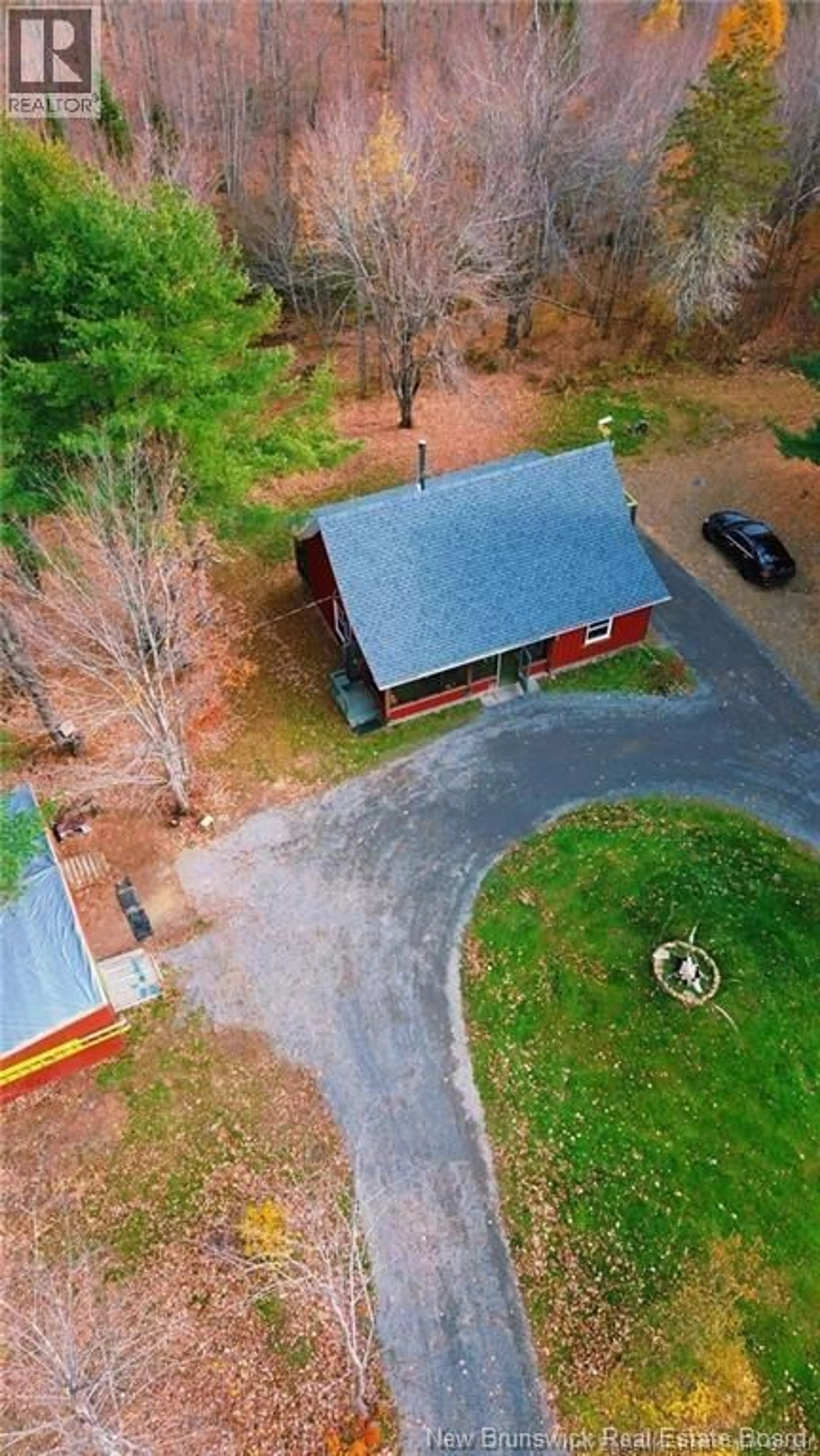 A pic from outside/outdoor area/front of a property/back of a property/a pic from drone, unknown for 39 BLOC 14 LANE, Acadieville New Brunswick E4Y1M2