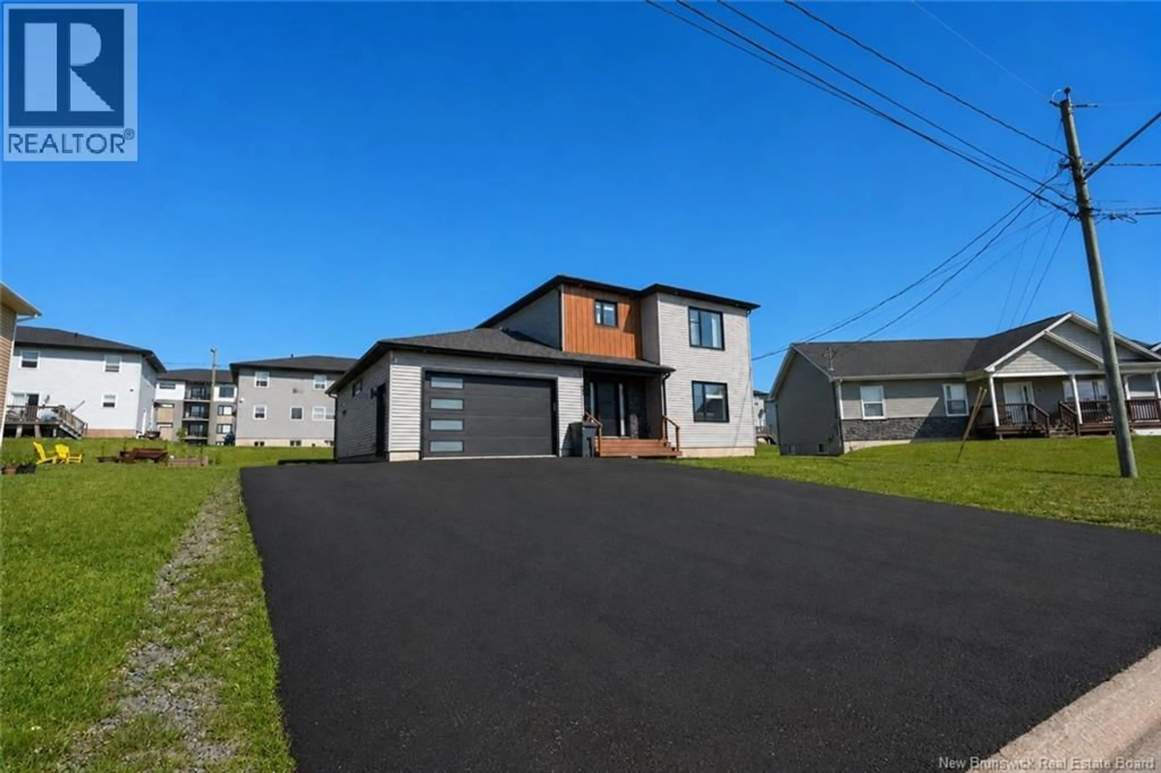 A pic from outside/outdoor area/front of a property/back of a property/a pic from drone, street for 22 MATHIAS ST, Dieppe New Brunswick E1A8N5
