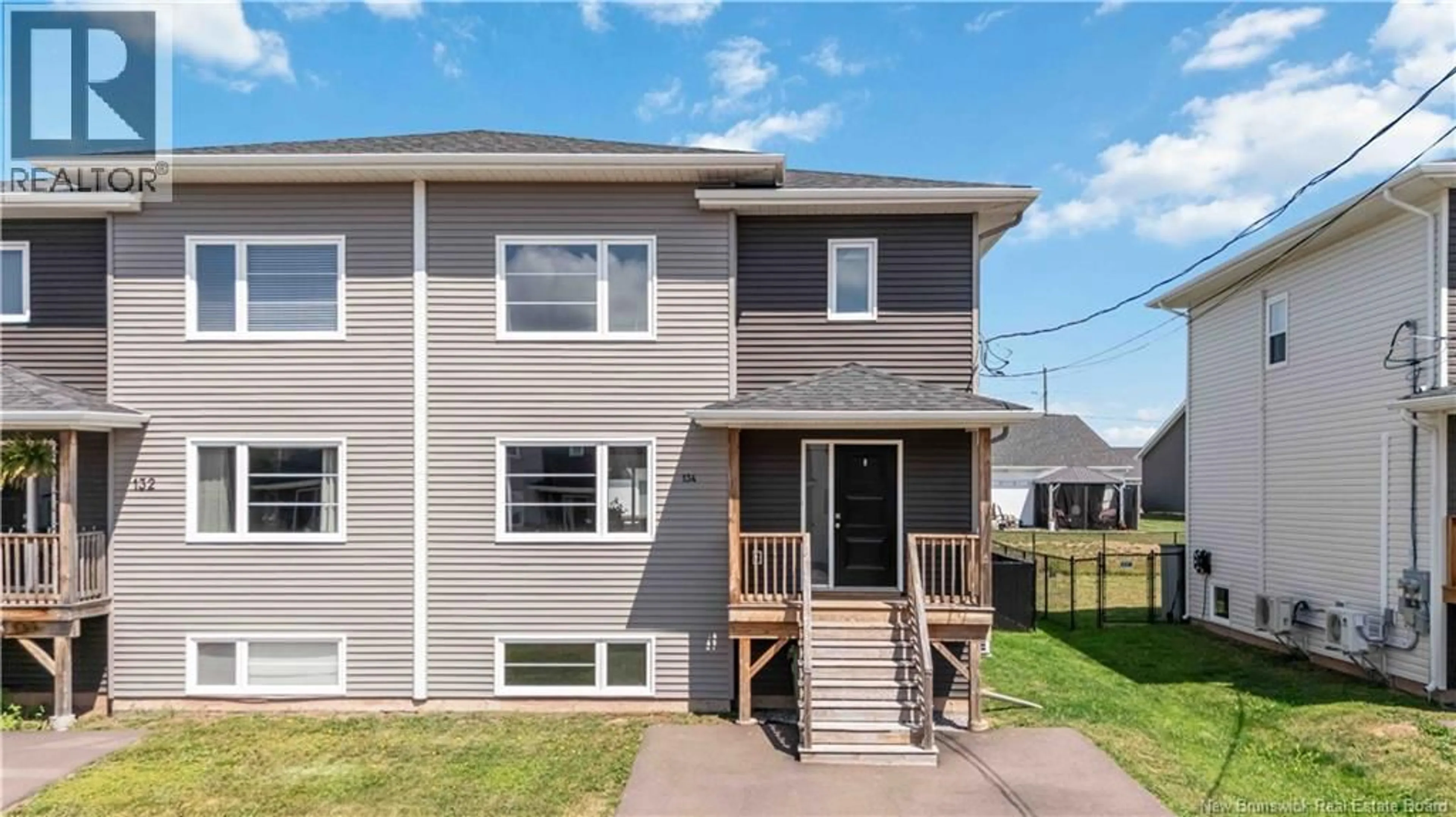 Home with vinyl exterior material, street for 134 MELANIE, Dieppe New Brunswick E1A6N4