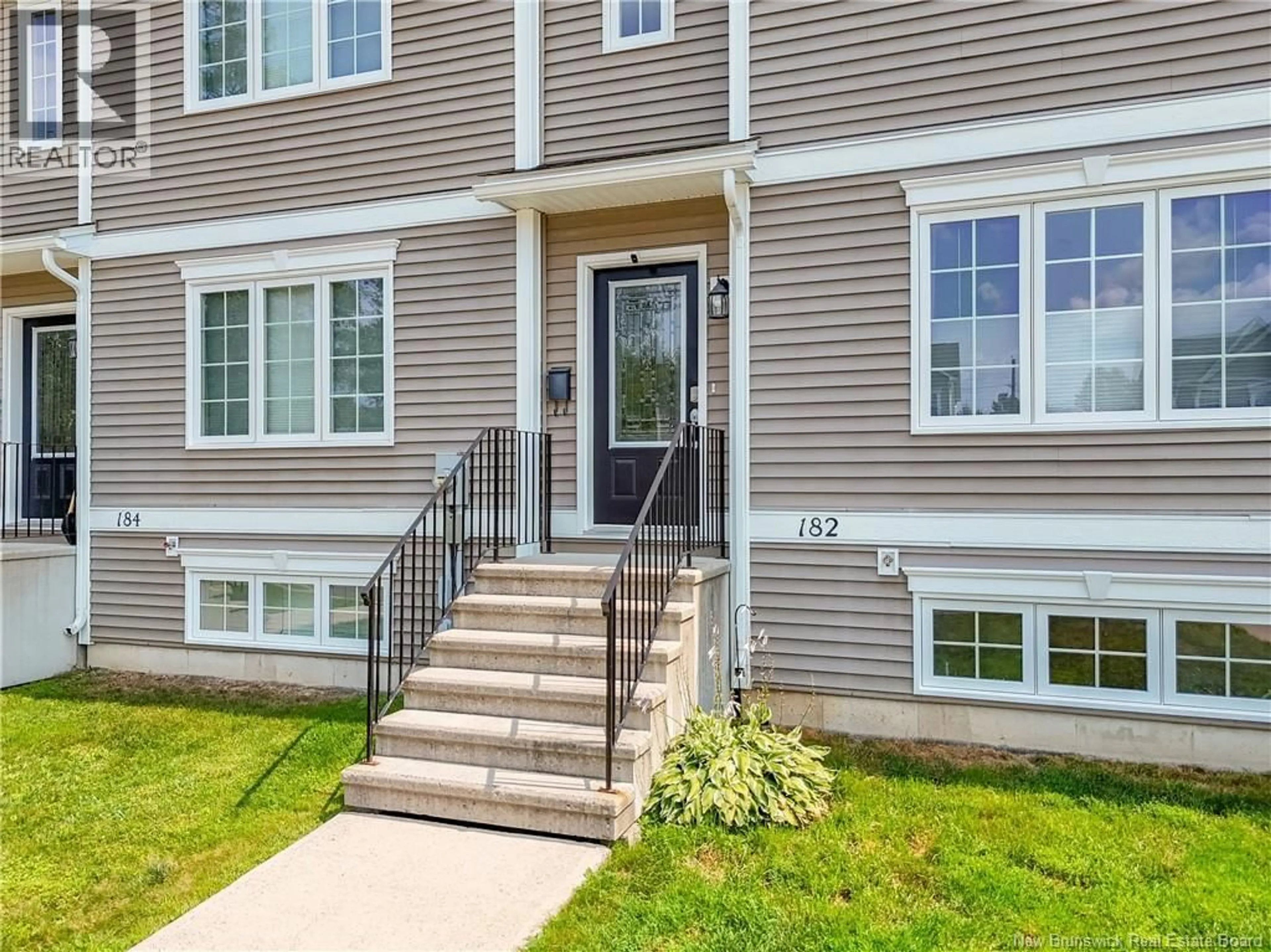 Home with vinyl exterior material, street for 182 JAMES STREET, Fredericton New Brunswick E3G0N8
