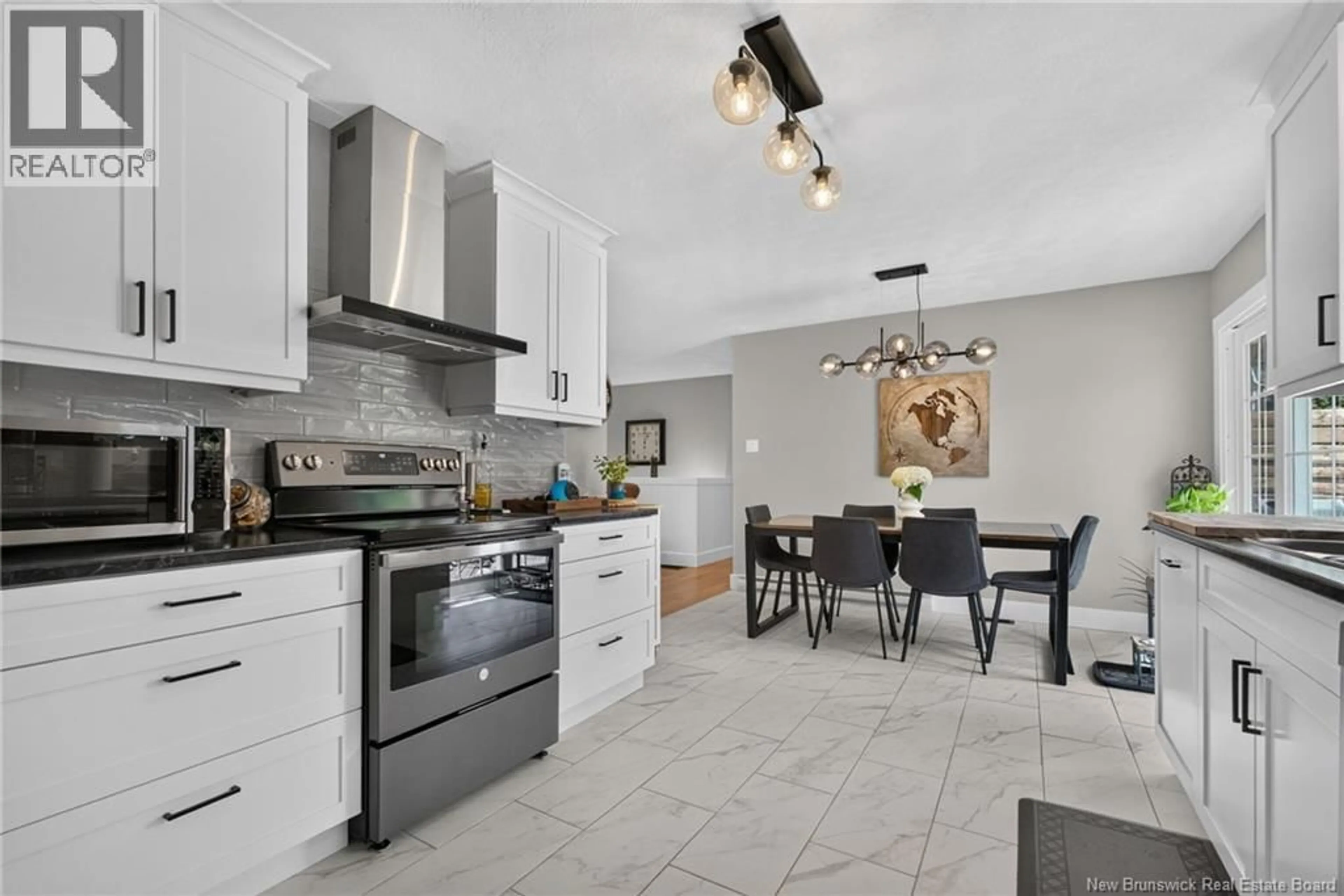 Open concept kitchen, ceramic/tile floor for 14 CABOT DRIVE, Moncton New Brunswick E1A5K9