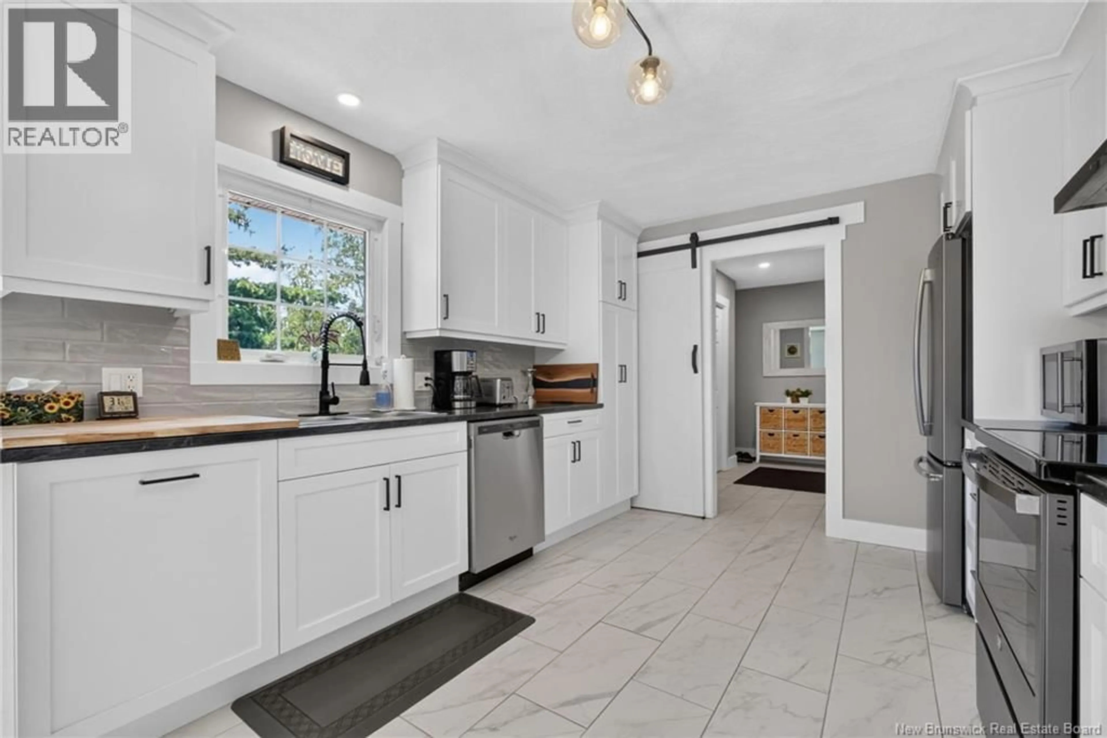 Open concept kitchen, ceramic/tile floor for 14 CABOT DRIVE, Moncton New Brunswick E1A5K9