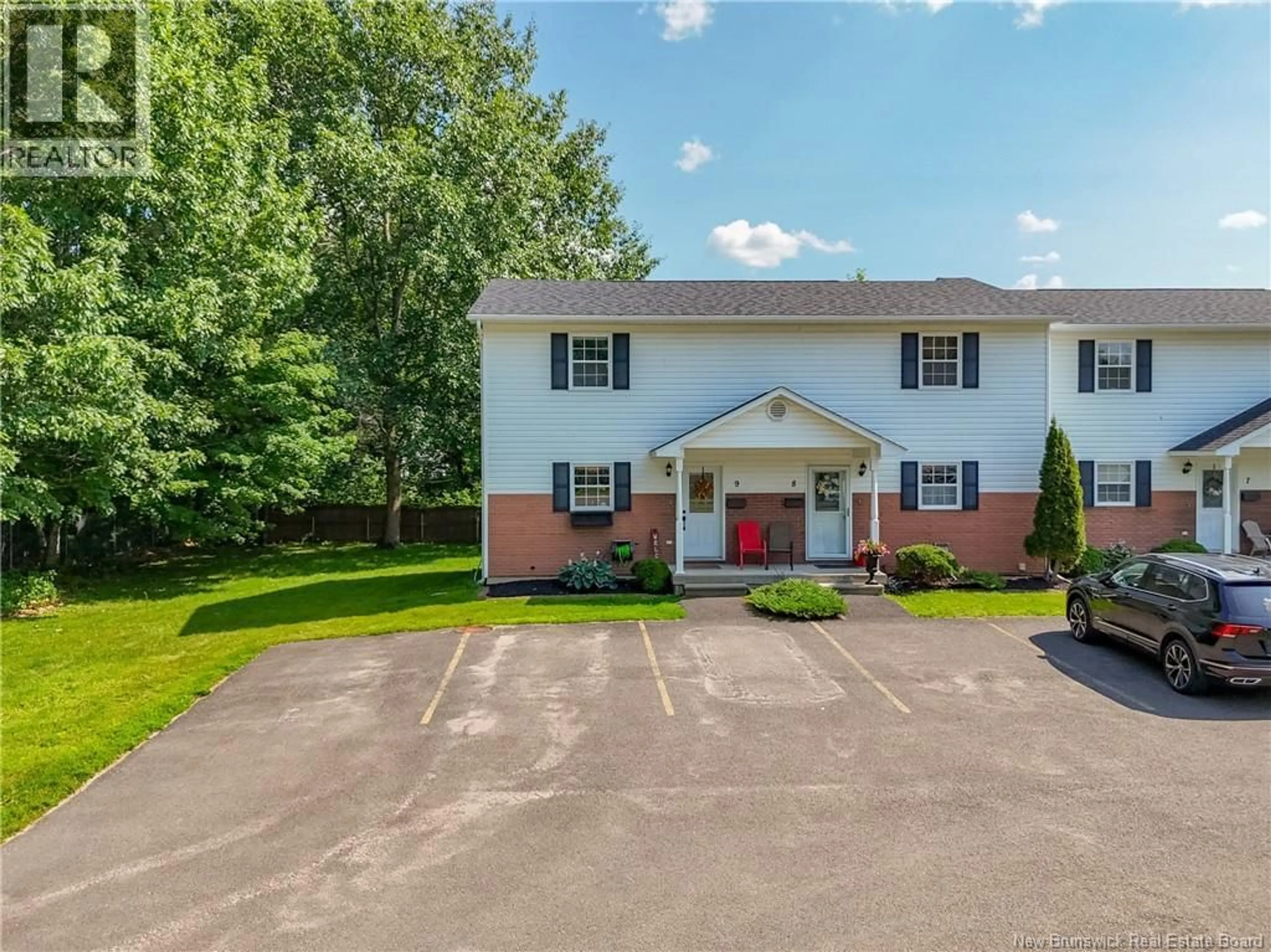 A pic from outside/outdoor area/front of a property/back of a property/a pic from drone, street for 9 - 175 RIVERSIDE DRIVE DRIVE, Fredericton New Brunswick E3A6R1