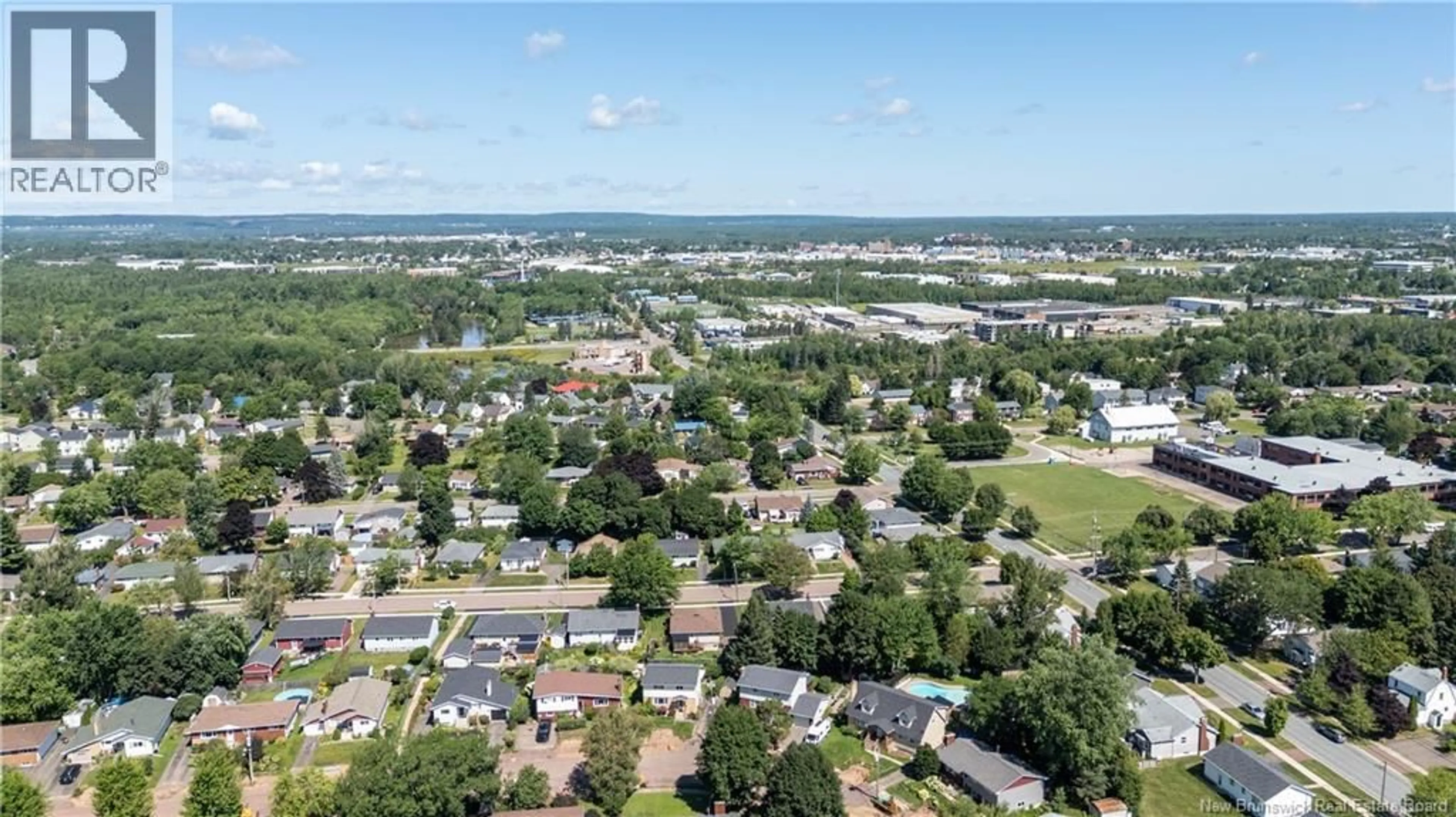 A pic from outside/outdoor area/front of a property/back of a property/a pic from drone, water/lake/river/ocean view for 133 BRENTWOOD DRIVE, Moncton New Brunswick E1E1N1