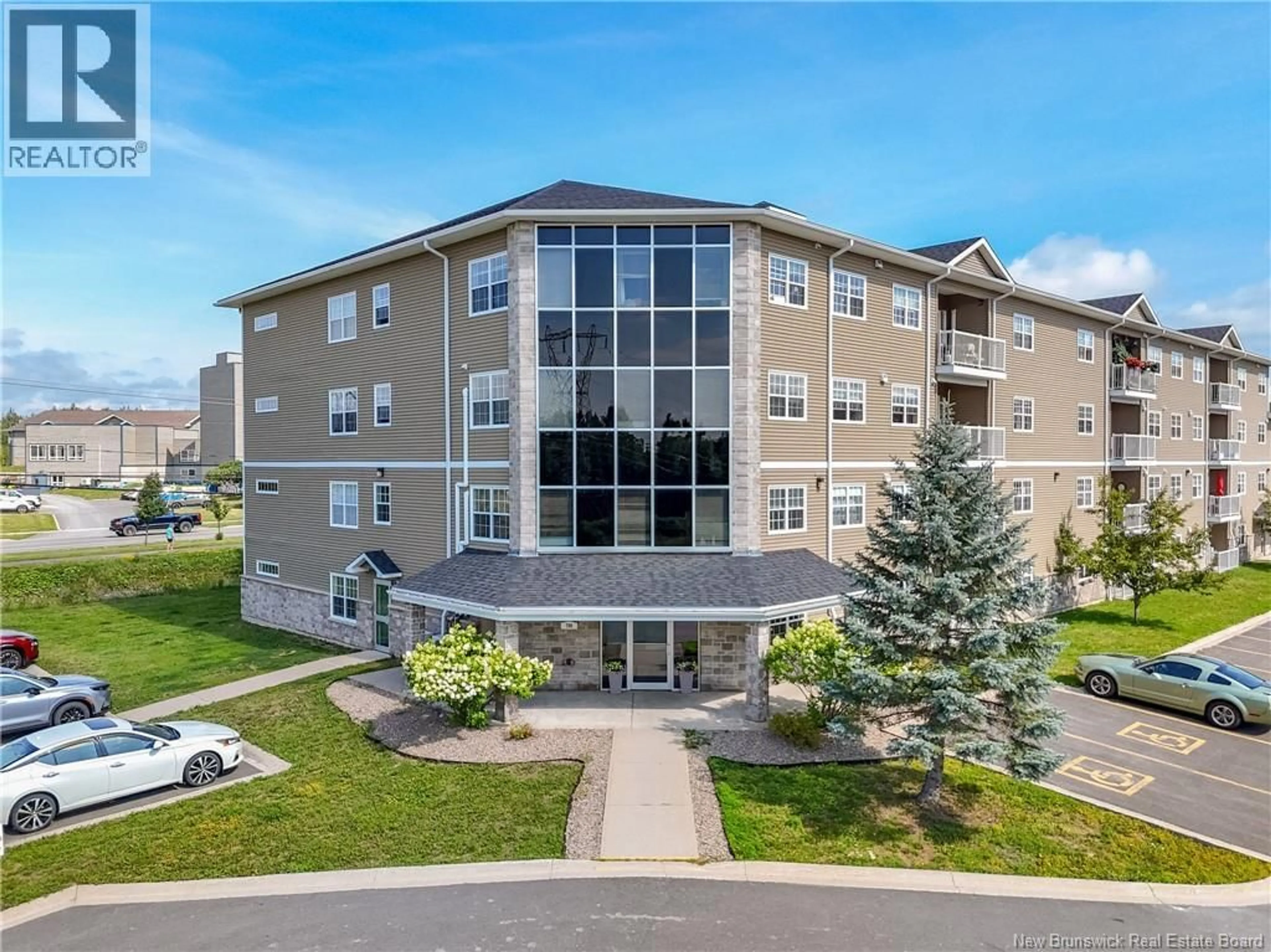 A pic from outside/outdoor area/front of a property/back of a property/a pic from drone, building for 407 - 700 CLIFFE STREET, Fredericton New Brunswick E3A5V2