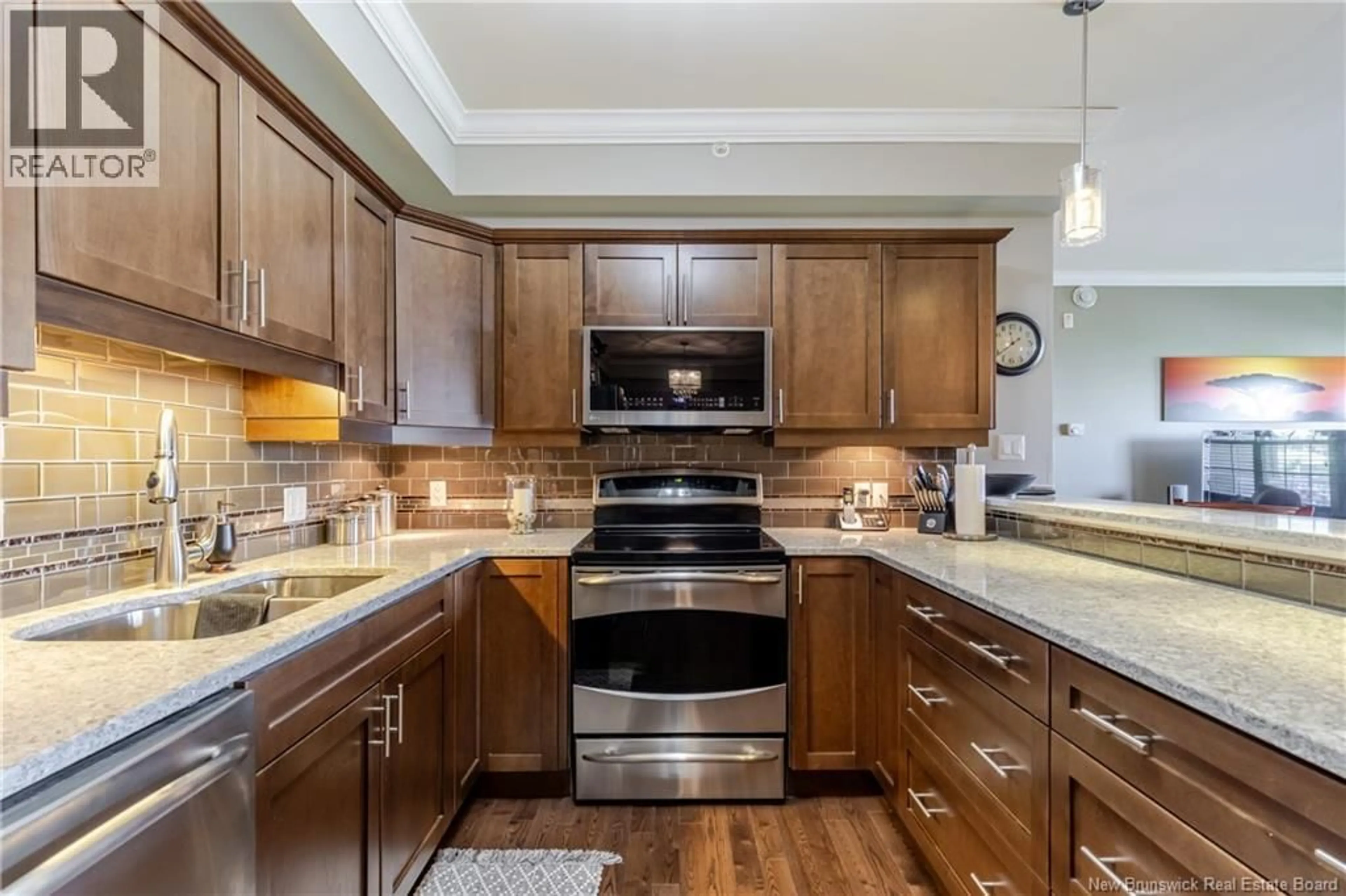 Open concept kitchen, ceramic/tile floor for 407 - 700 CLIFFE STREET, Fredericton New Brunswick E3A5V2
