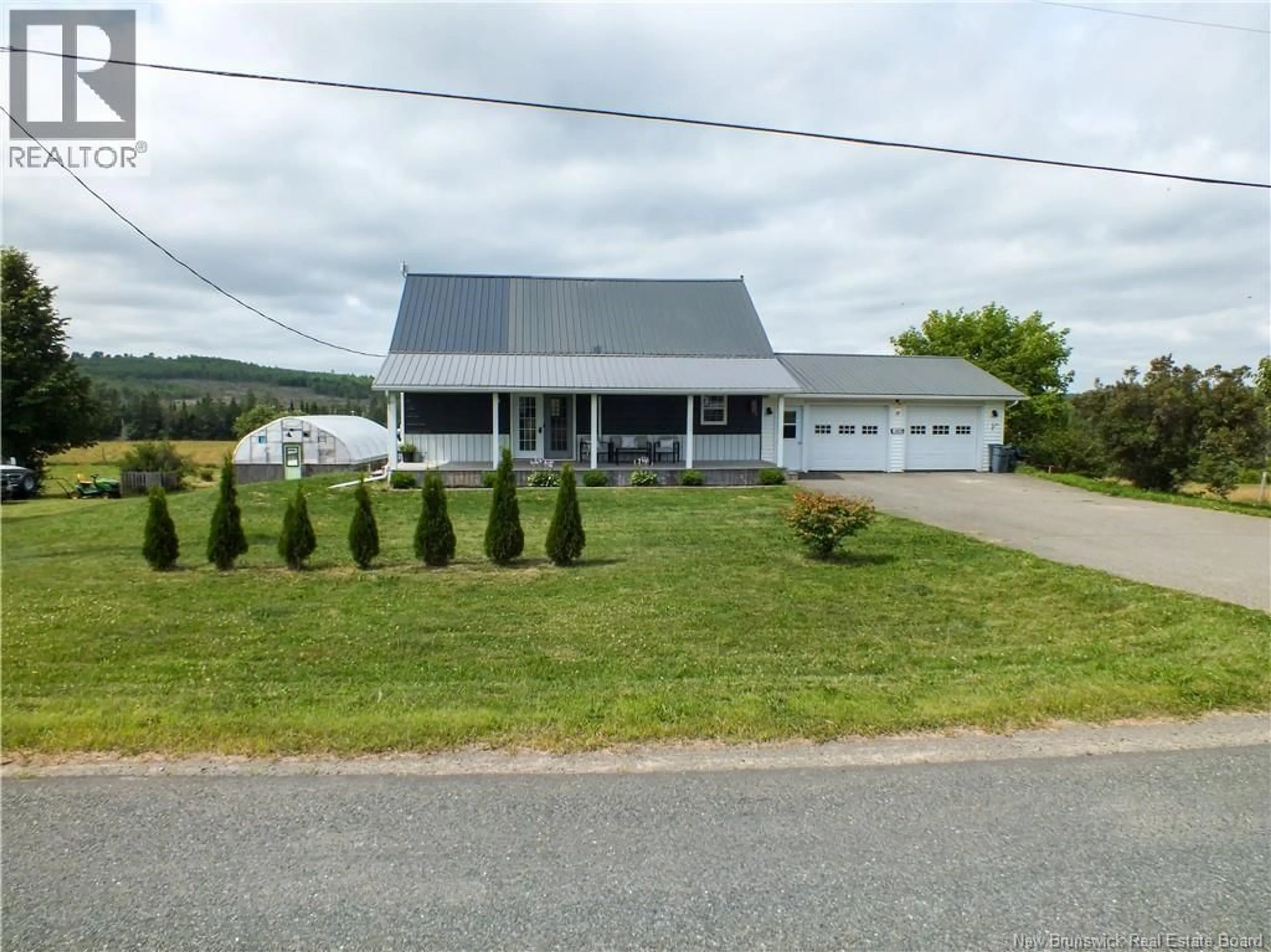 A pic from outside/outdoor area/front of a property/back of a property/a pic from drone, unknown for 1409 ROUTE 570, Gordonsville New Brunswick E7L2M9