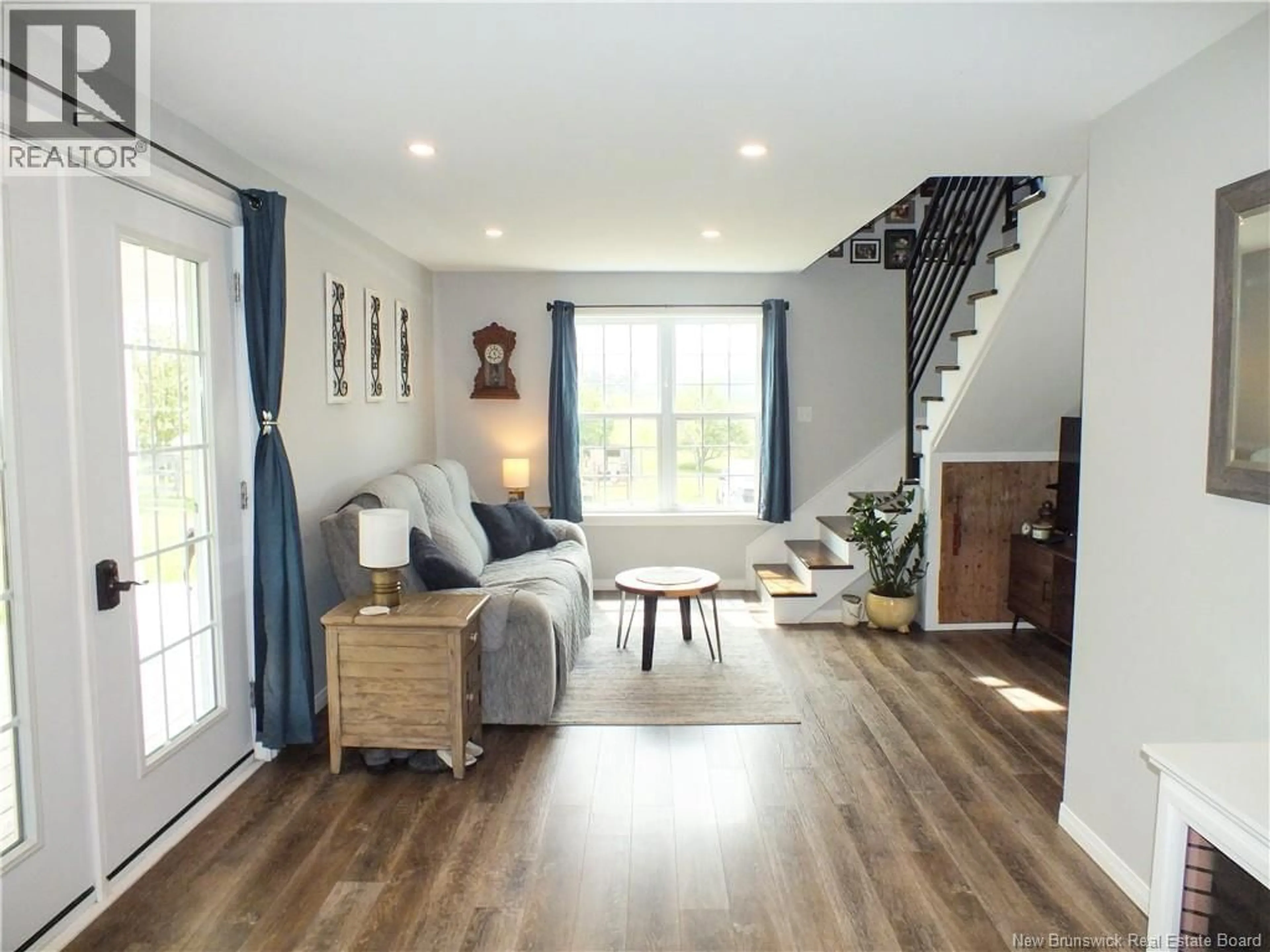 Living room with furniture, wood/laminate floor for 1409 ROUTE 570, Gordonsville New Brunswick E7L2M9
