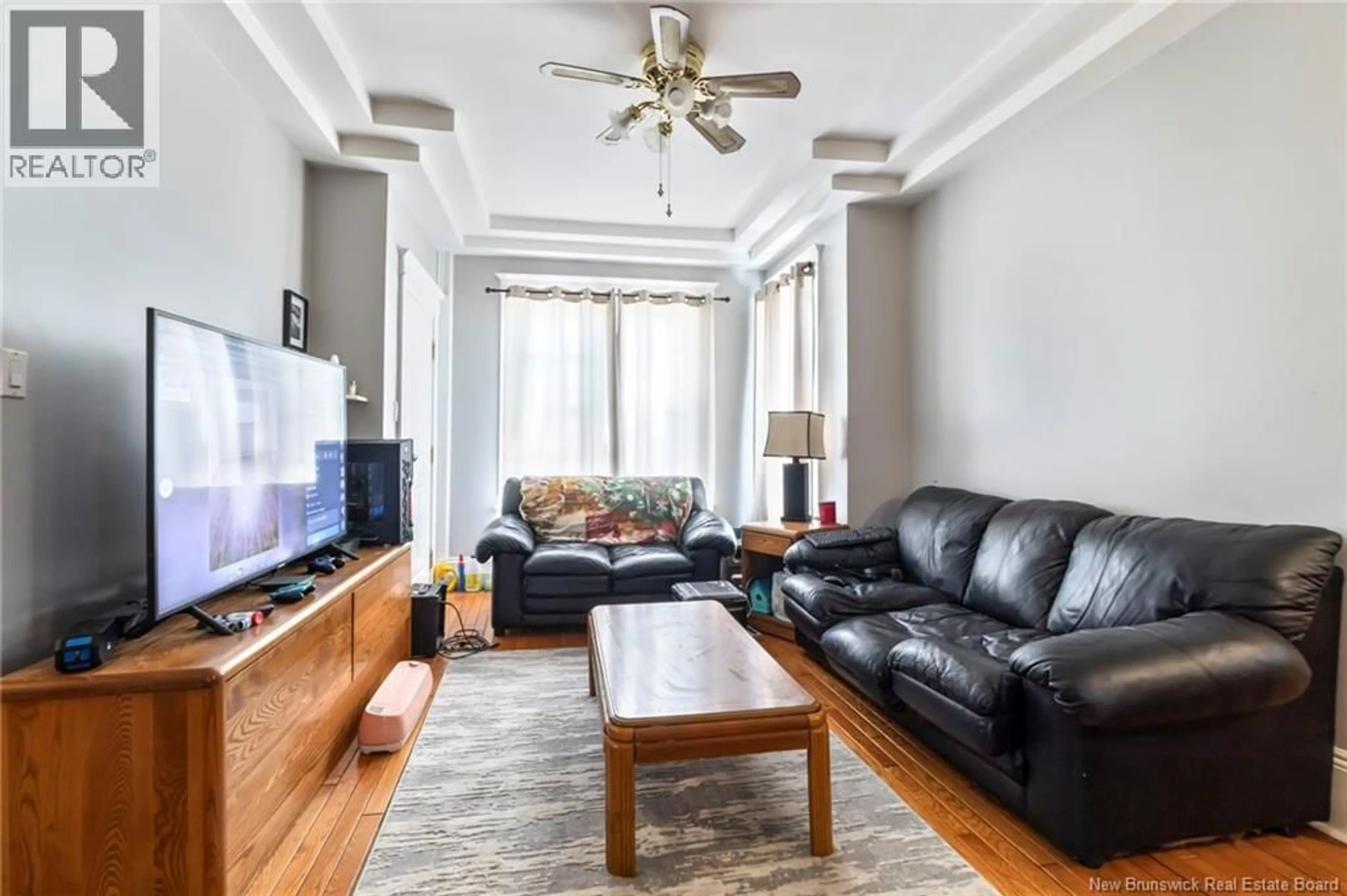 Living room with furniture, unknown for 110 CORNHILL, Moncton New Brunswick E1C6L1