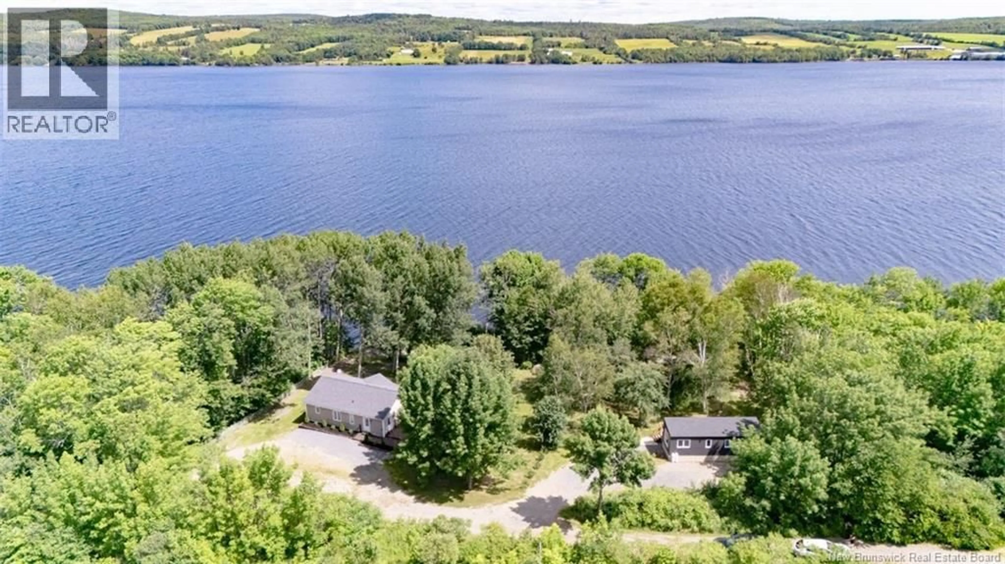A pic from outside/outdoor area/front of a property/back of a property/a pic from drone, water/lake/river/ocean view for 6545 ROUTE 102, Prince William New Brunswick E6K3T4