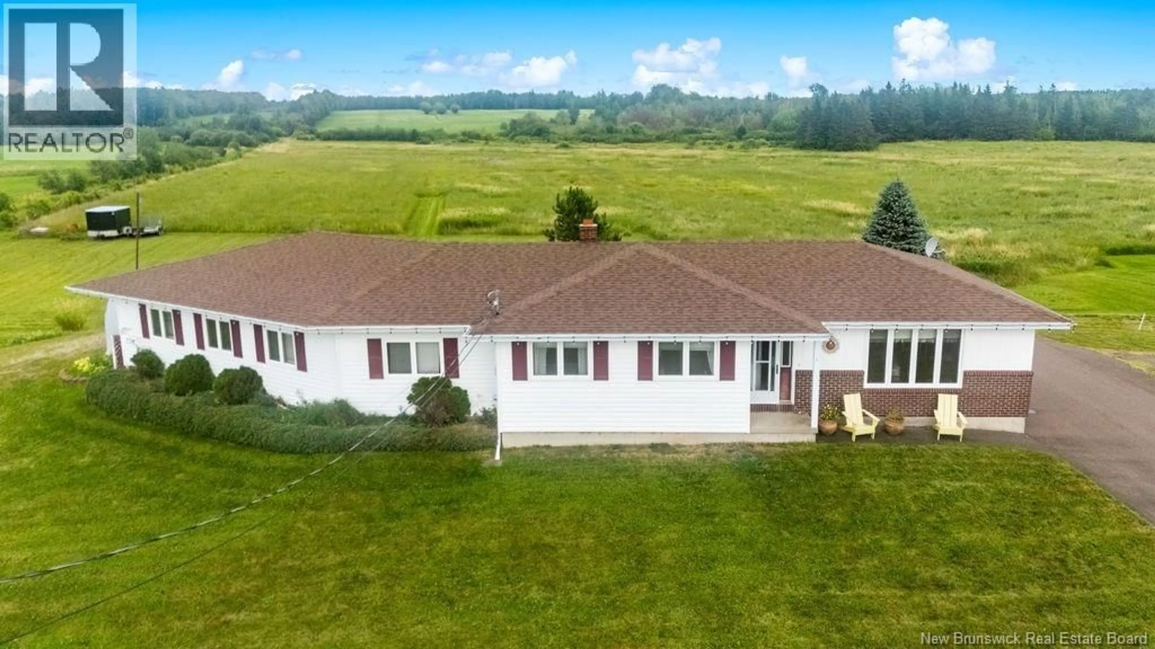 A pic from outside/outdoor area/front of a property/back of a property/a pic from drone, unknown for 3546 ROUTE 132, Scoudouc New Brunswick E4P3M6