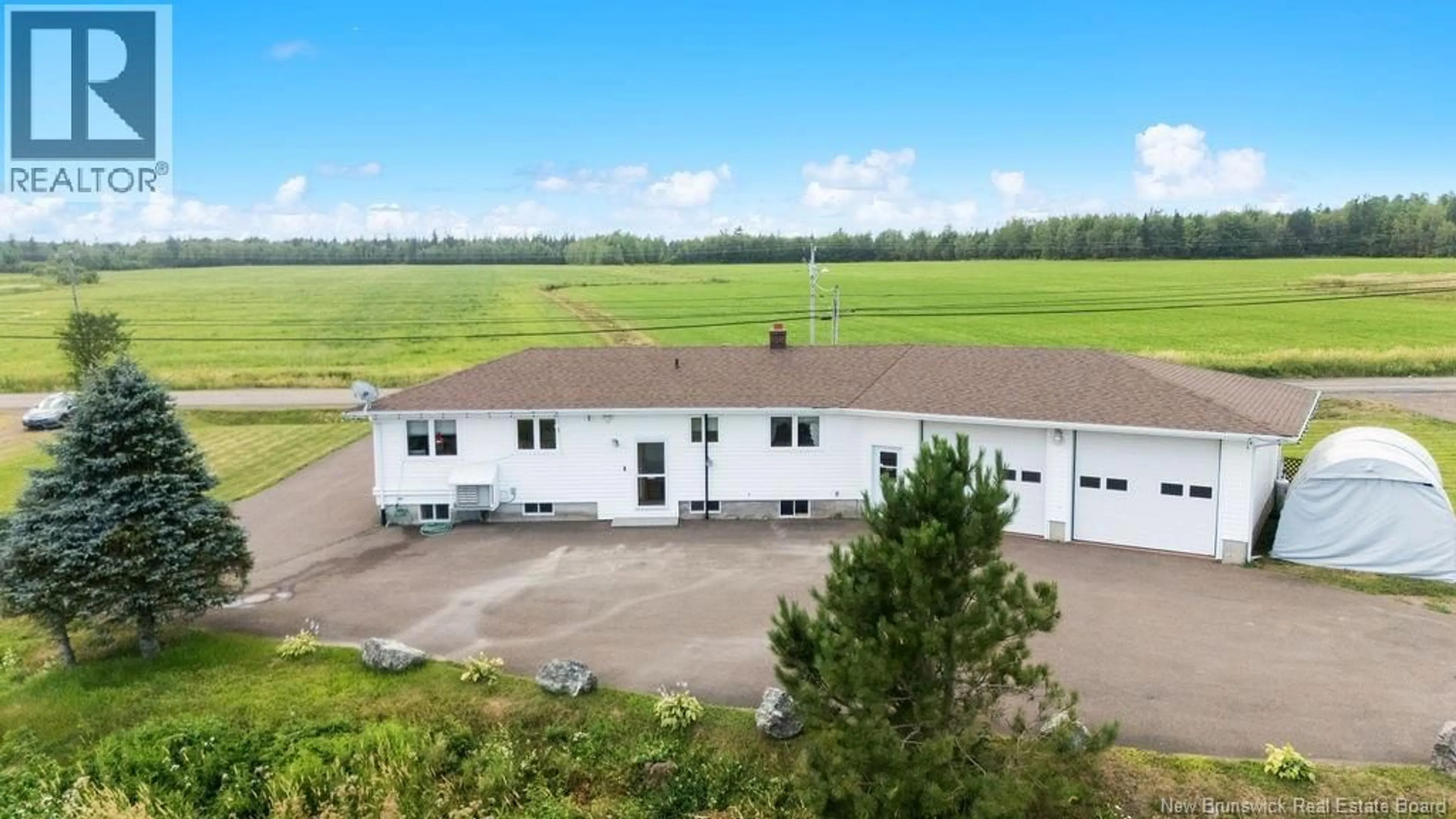 A pic from outside/outdoor area/front of a property/back of a property/a pic from drone, building for 3546 ROUTE 132, Scoudouc New Brunswick E4P3M6