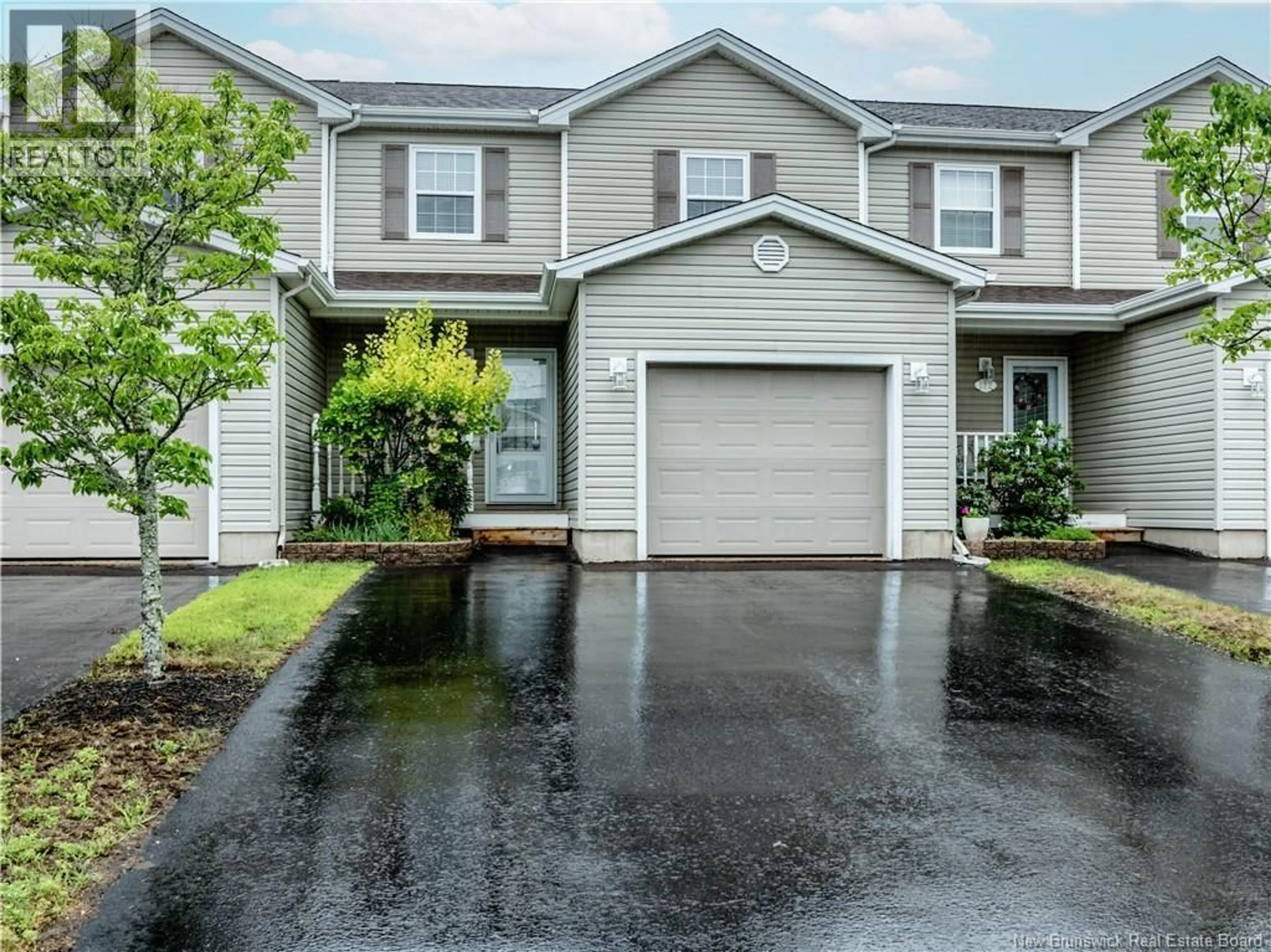 Home with vinyl exterior material, street for 3 - 110 DOMETHILDE CRESCENT, Dieppe New Brunswick E1A8R3