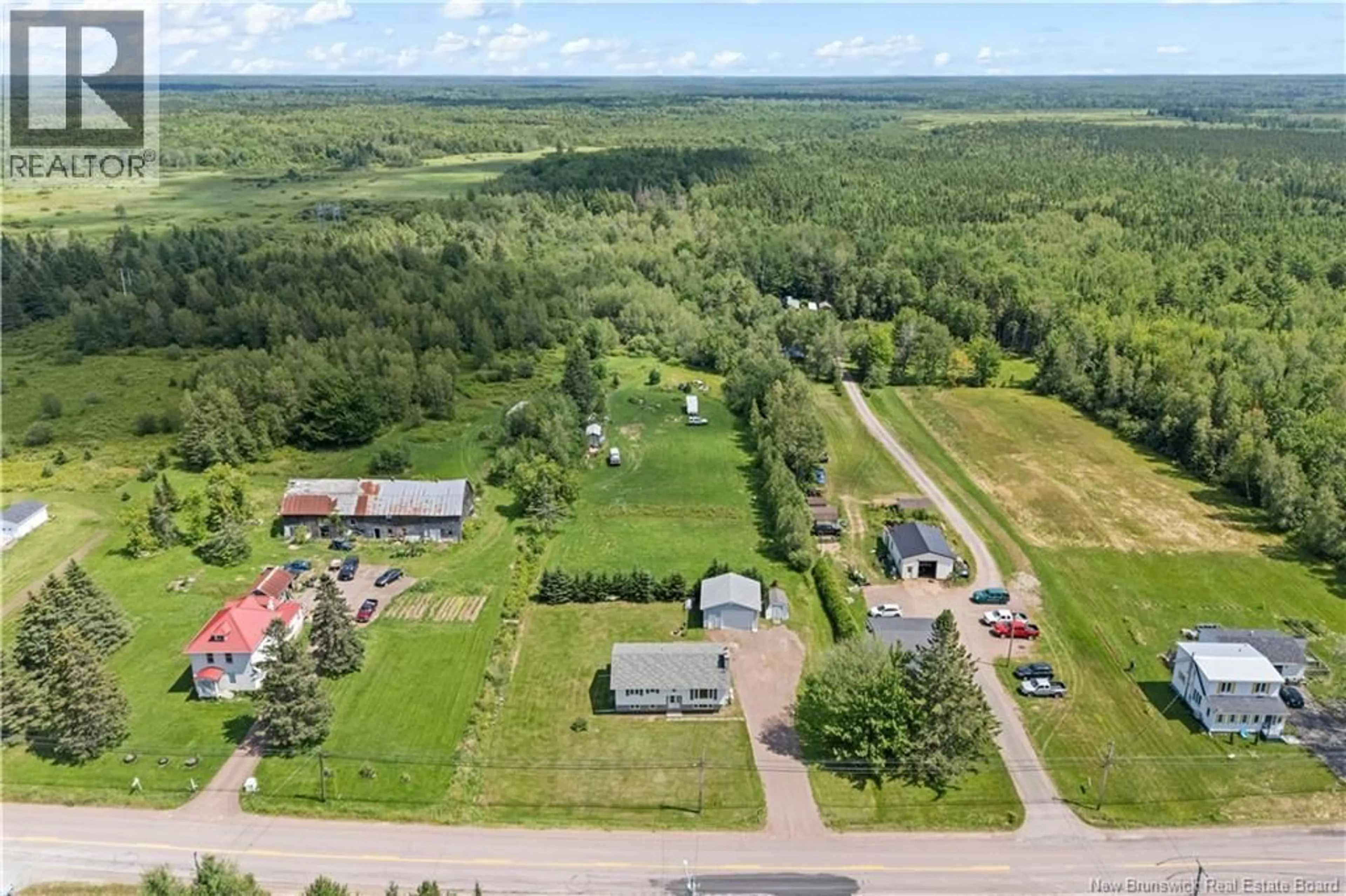 A pic from outside/outdoor area/front of a property/back of a property/a pic from drone, unknown for 3292 ROUTE 132, Scoudouc New Brunswick E4P3S1