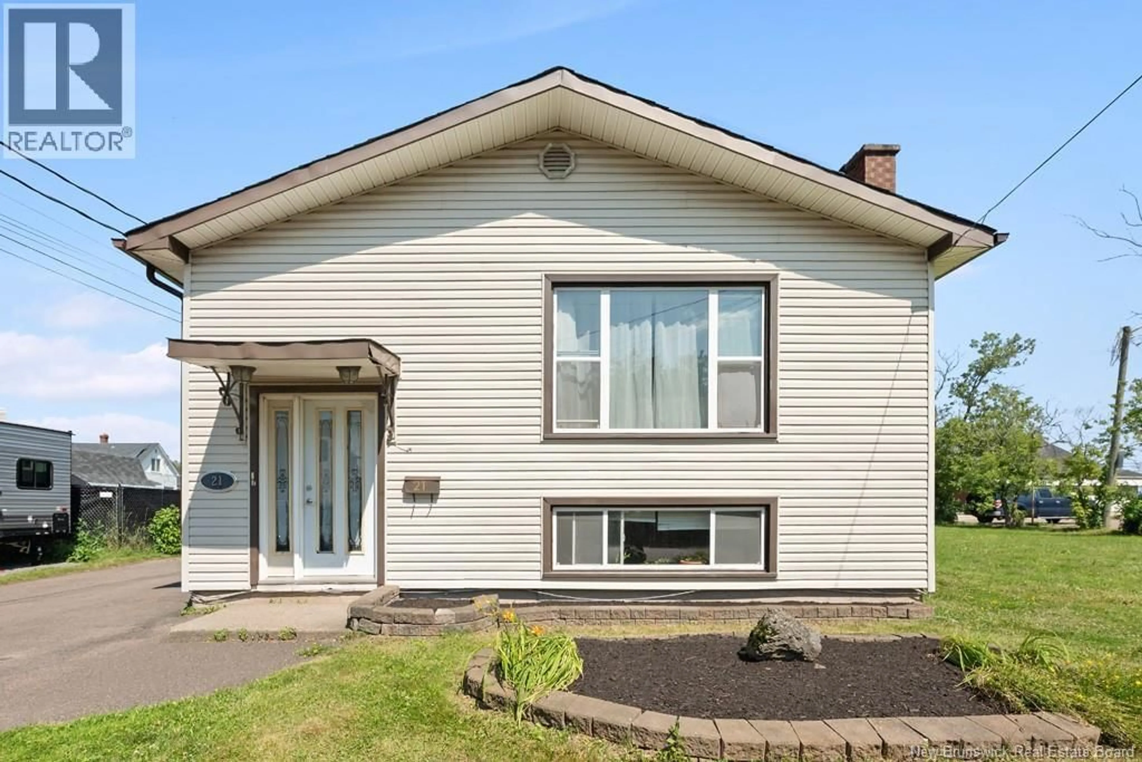 Home with vinyl exterior material, street for 21 SPRUCE STREET, Moncton New Brunswick E1C7K1