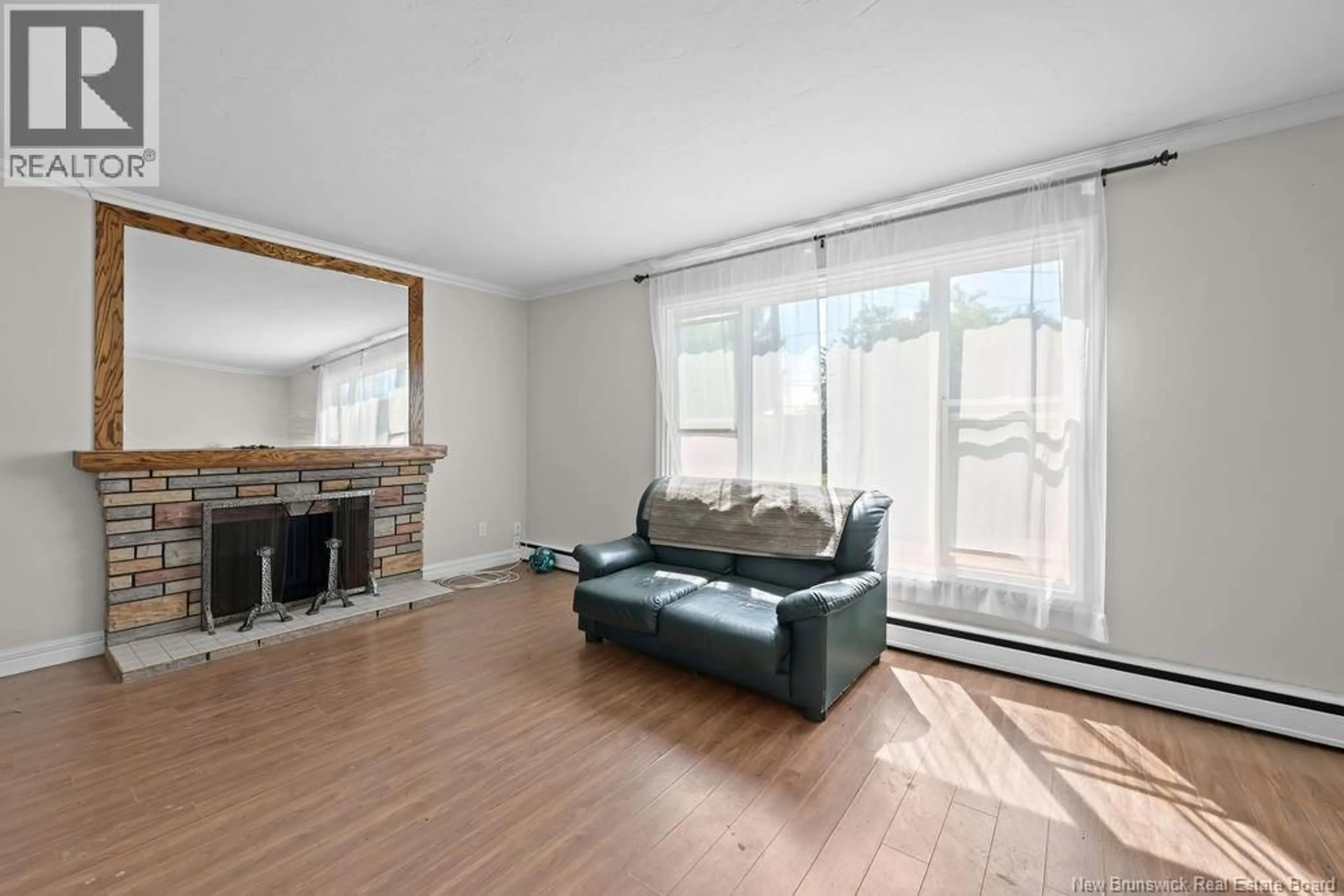 Living room with furniture, unknown for 21 SPRUCE STREET, Moncton New Brunswick E1C7K1
