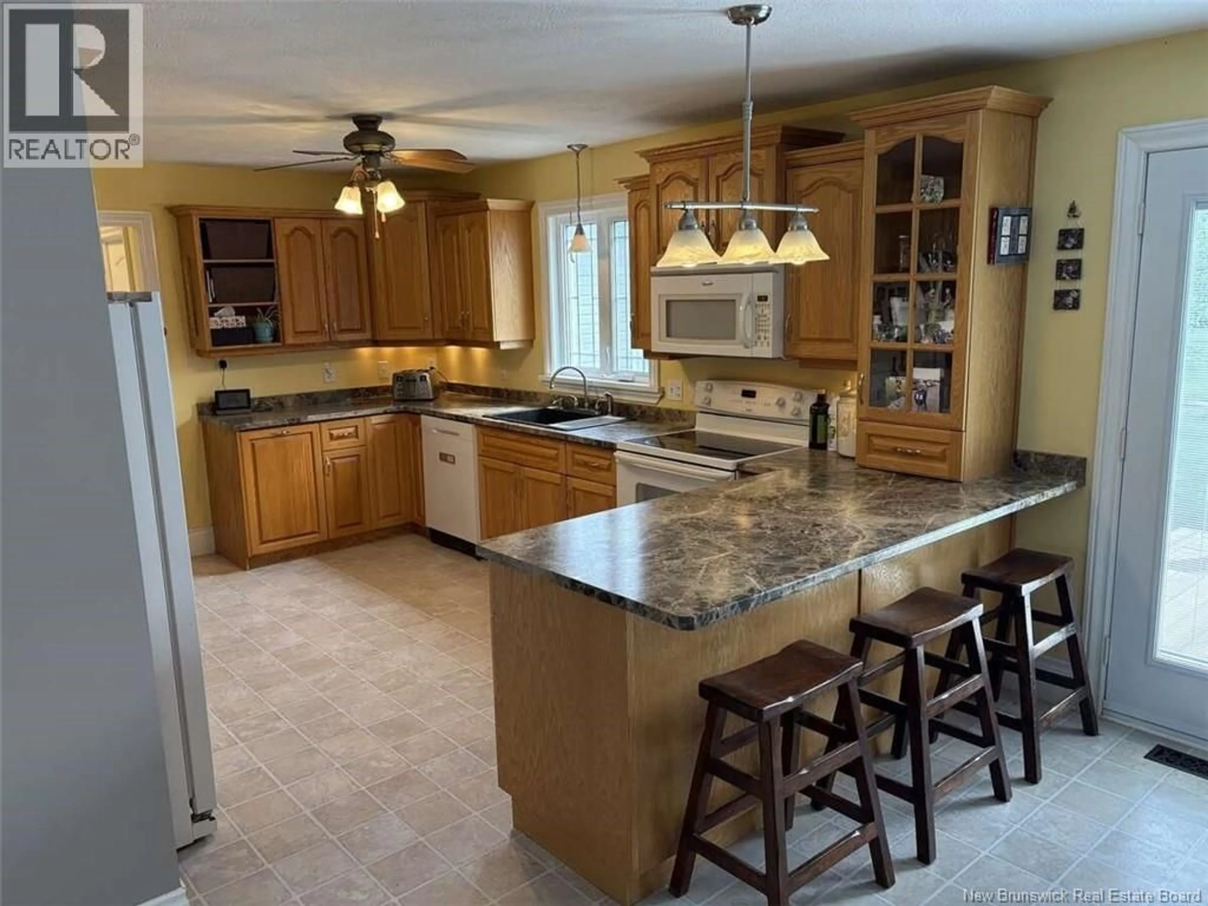 Open concept kitchen, ceramic/tile floor for 30 JORDAN DRIVE, Hanwell New Brunswick E3E2N5