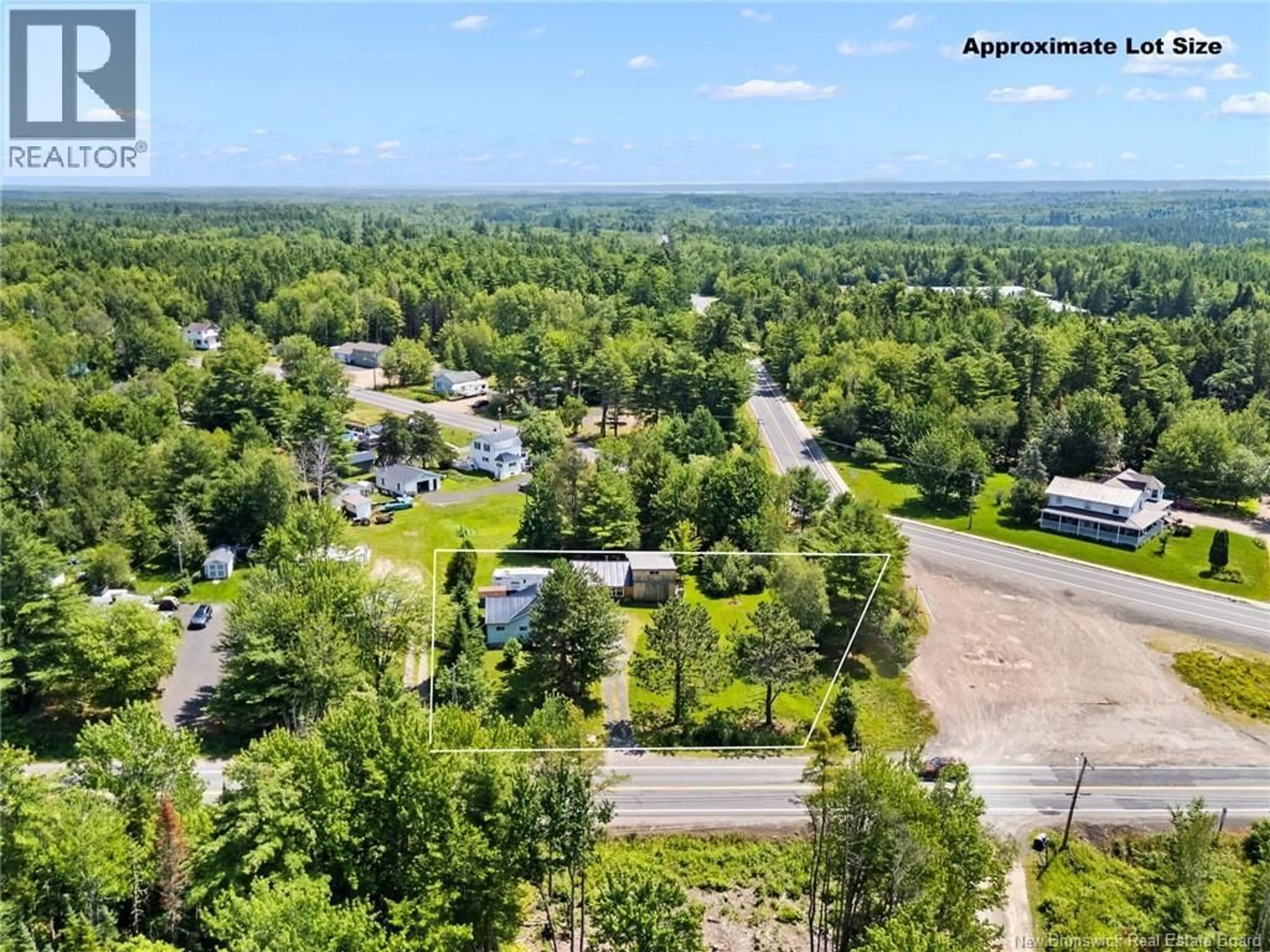A pic from outside/outdoor area/front of a property/back of a property/a pic from drone, forest/trees view for 880 PLEASANT DRIVE, Minto New Brunswick E4B2V5