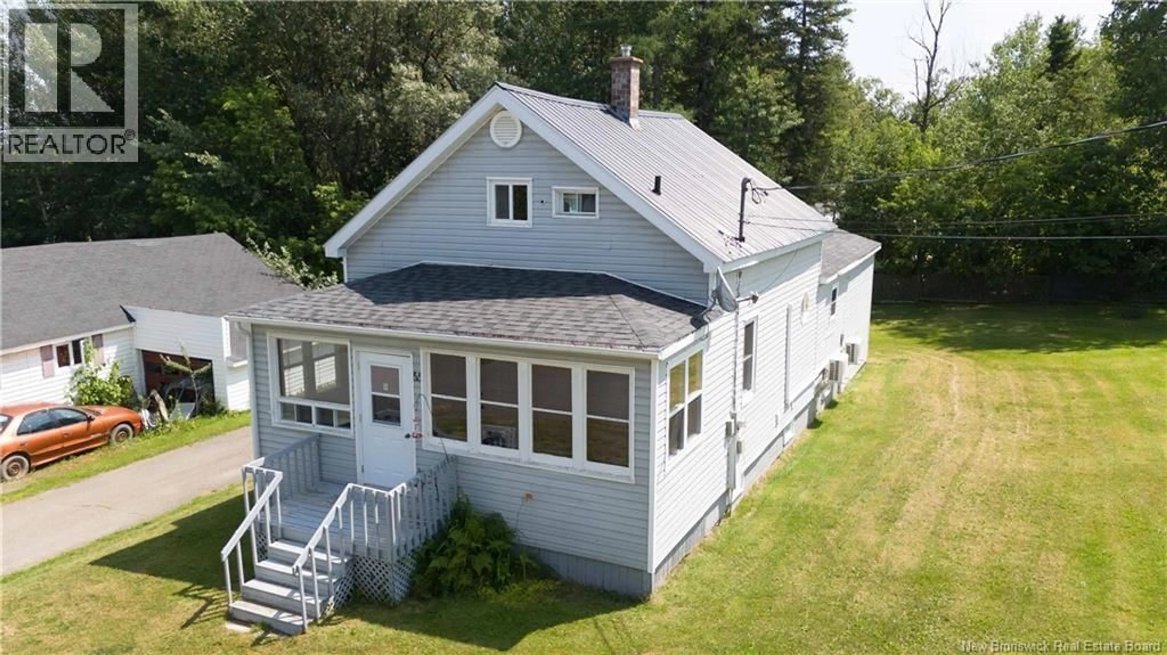A pic from outside/outdoor area/front of a property/back of a property/a pic from drone, building for 55 POST STREET, Plaster Rock New Brunswick E7G2M7