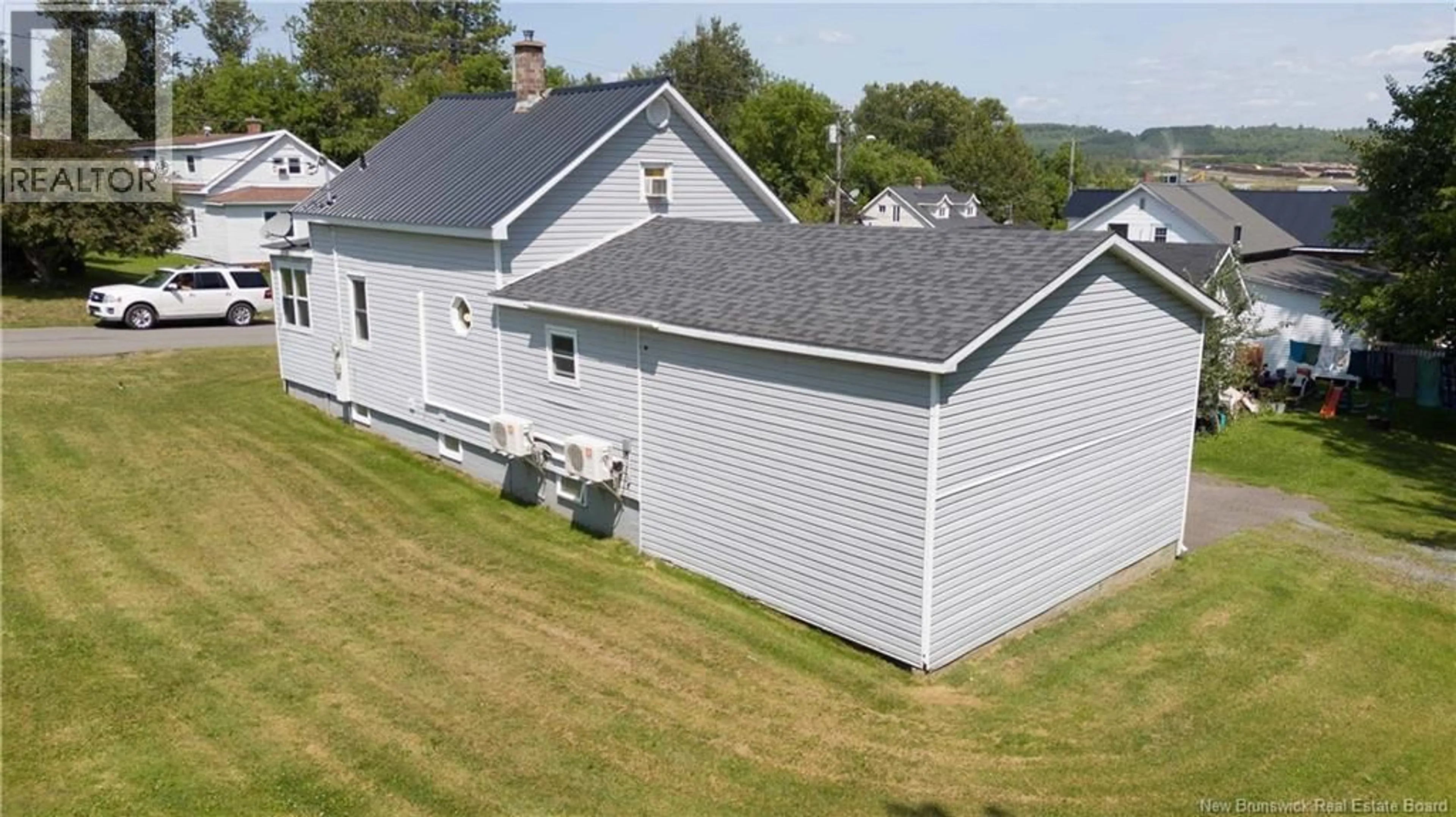 A pic from outside/outdoor area/front of a property/back of a property/a pic from drone, building for 55 POST STREET, Plaster Rock New Brunswick E7G2M7