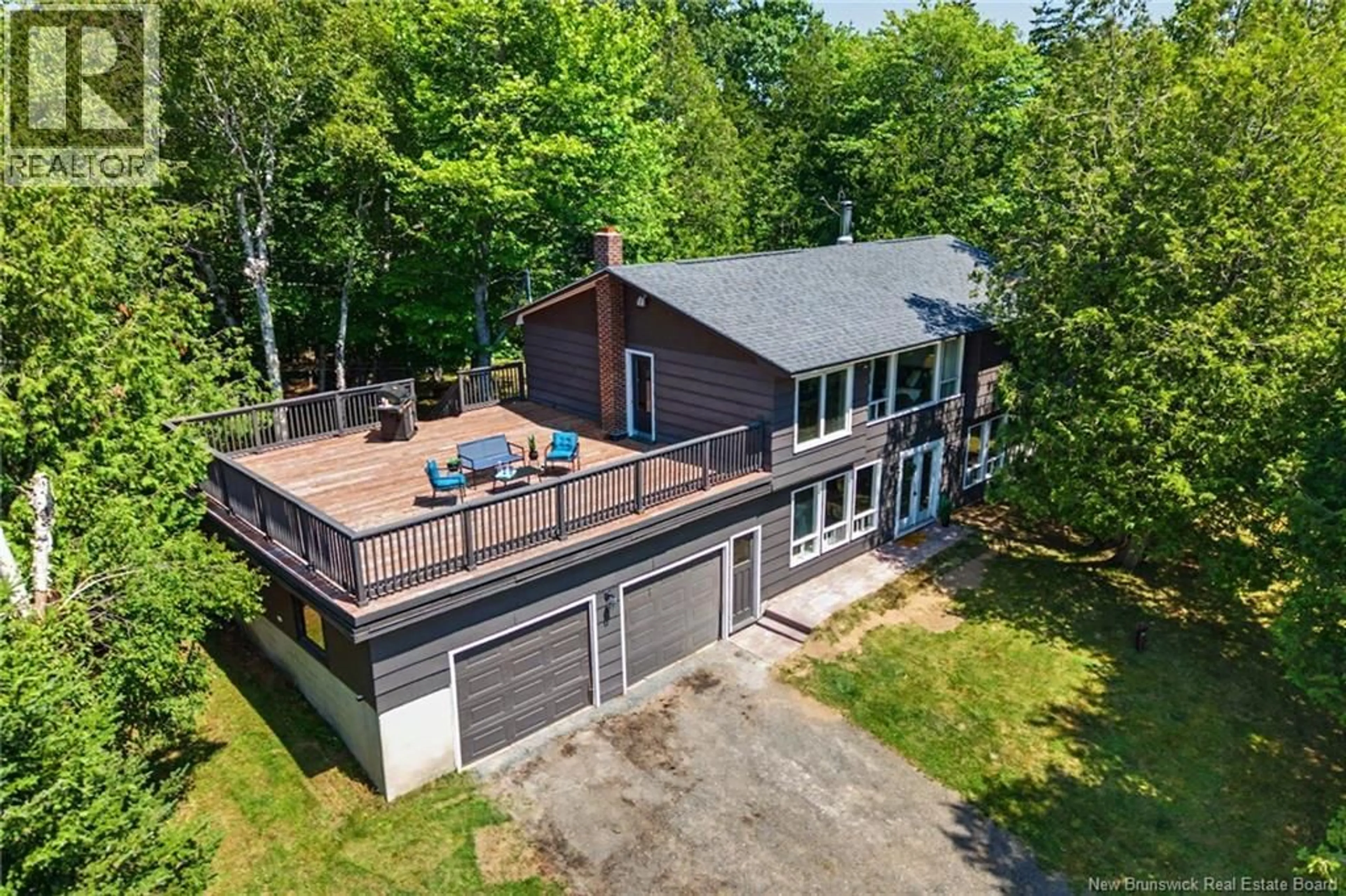 A pic from outside/outdoor area/front of a property/back of a property/a pic from drone, water/lake/river/ocean view for 188 CARLISLE RD, Douglas New Brunswick E3G7N5