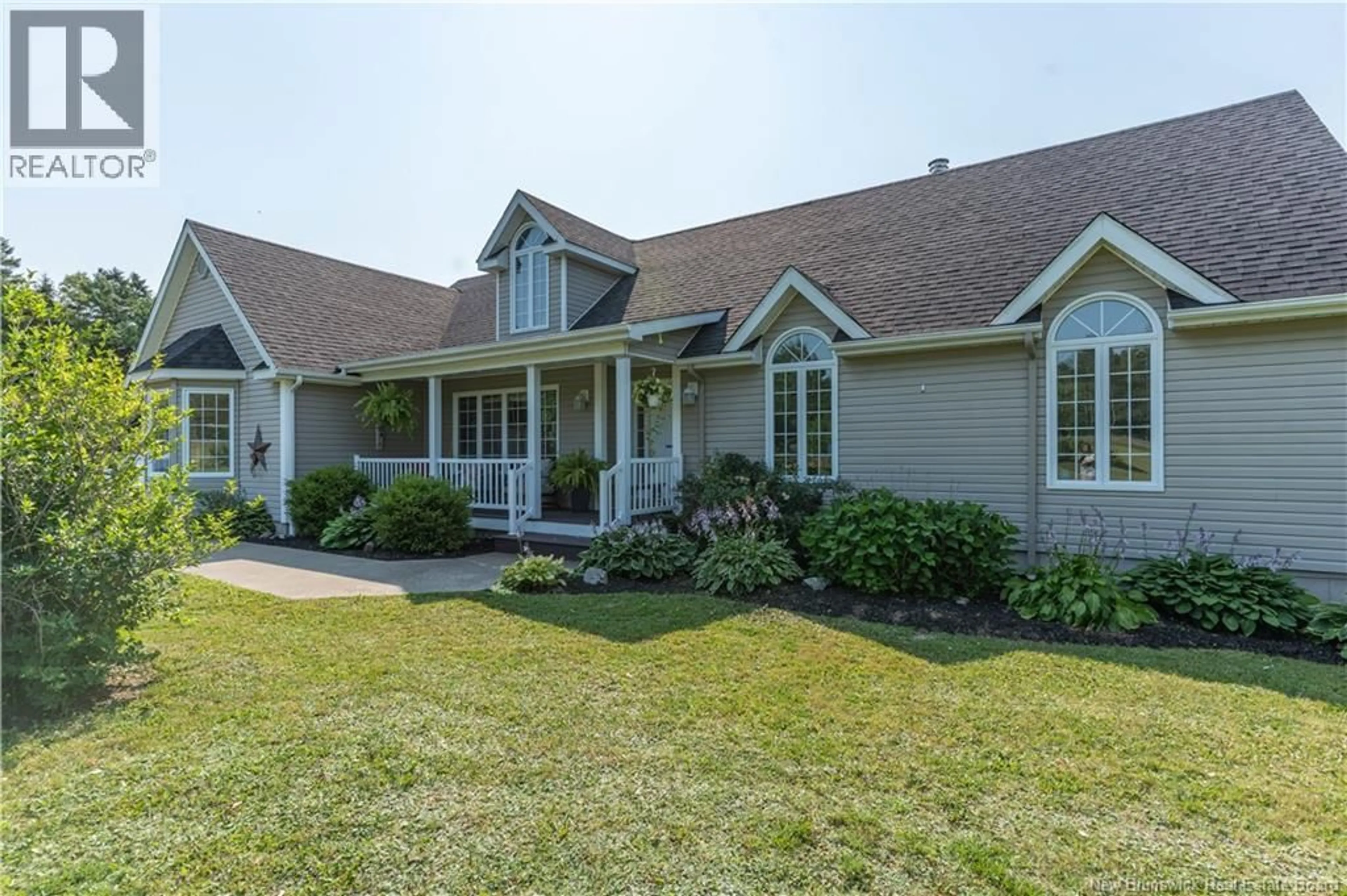 Home with vinyl exterior material, street for 390 ROUTE 11, Lower Newcastle New Brunswick E1V7G2