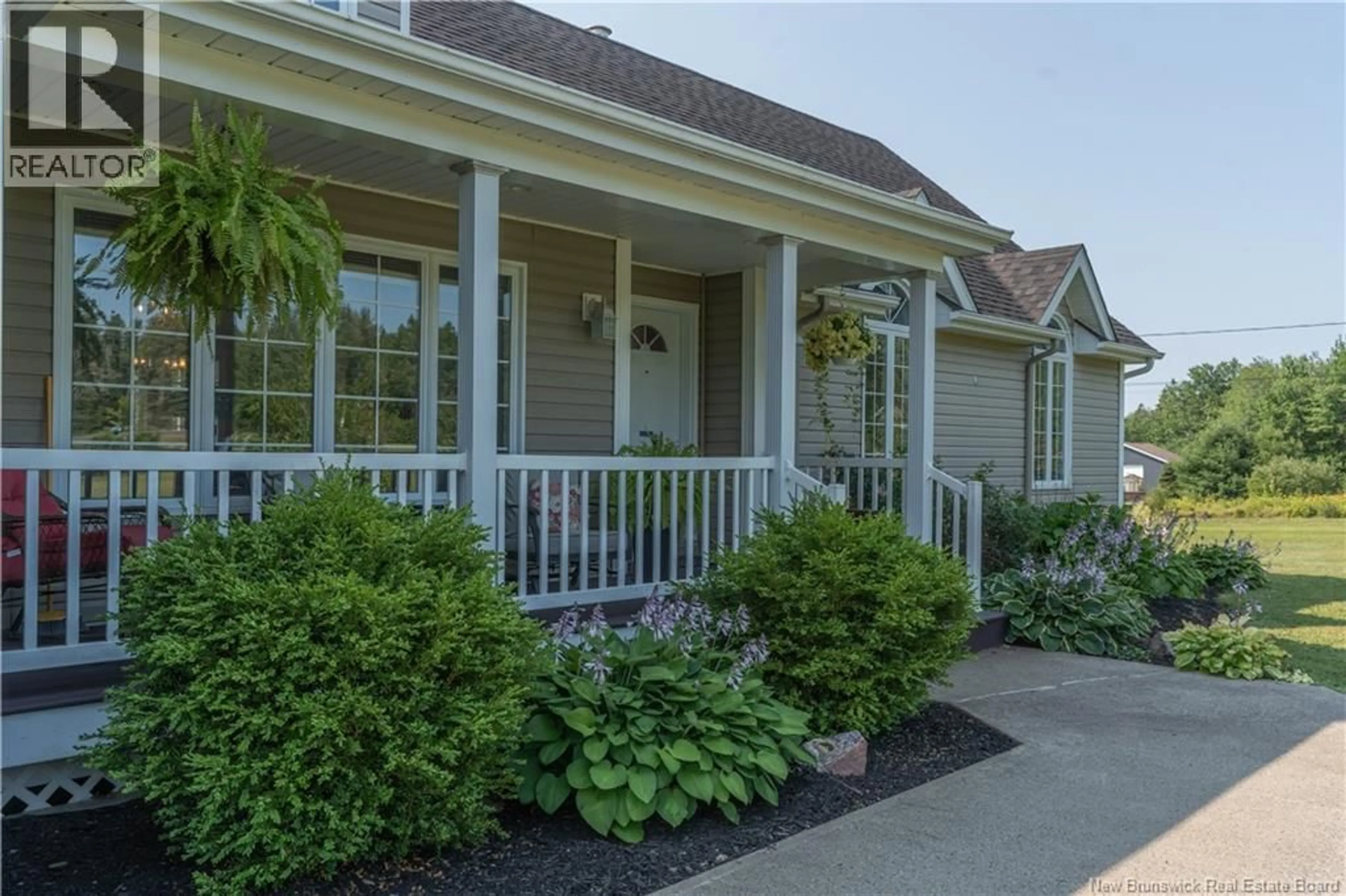 Home with vinyl exterior material, street for 390 ROUTE 11, Lower Newcastle New Brunswick E1V7G2