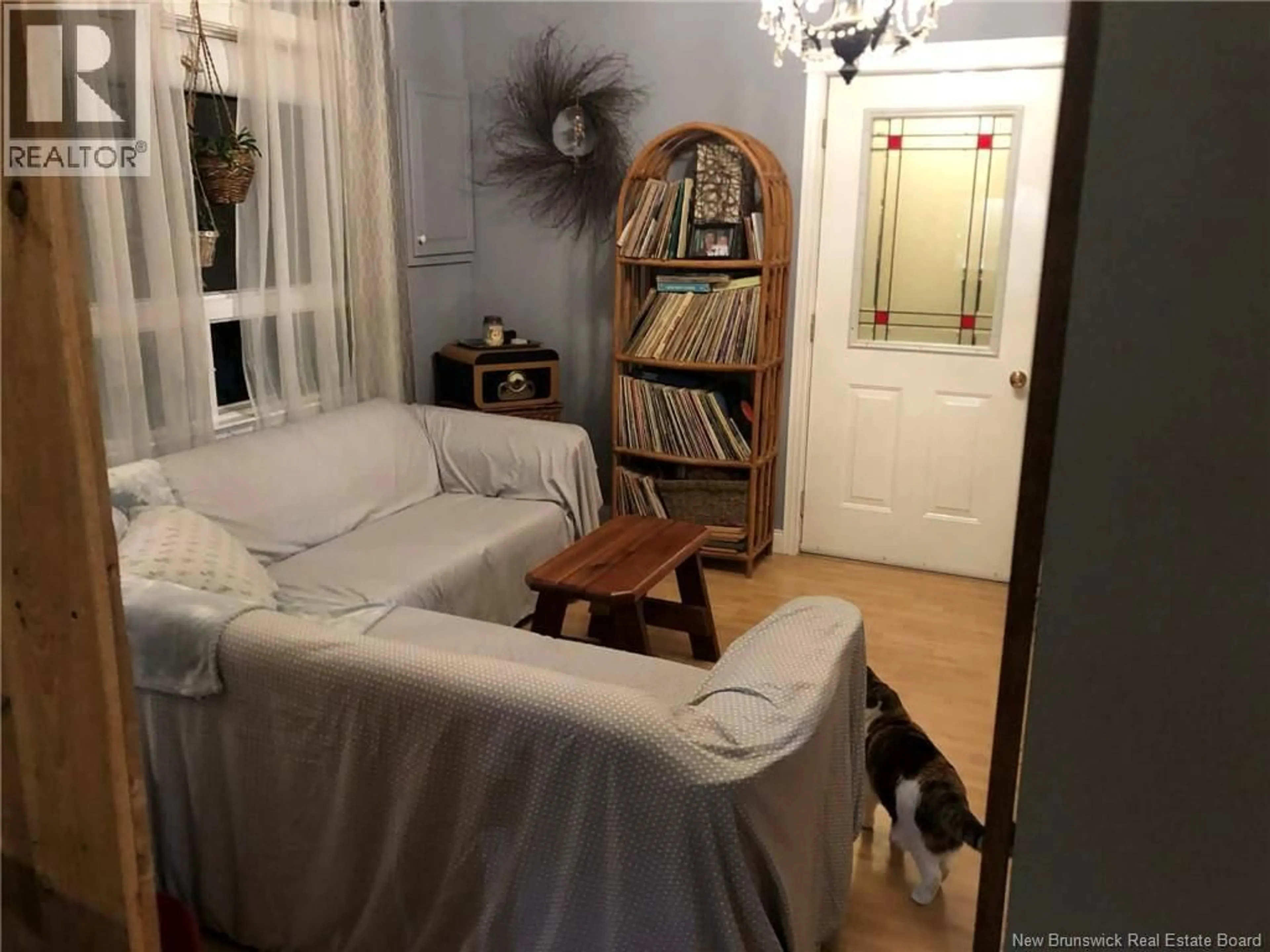Living room with furniture, wood/laminate floor for 7 OAK STREET, McAdam New Brunswick E6J1M5
