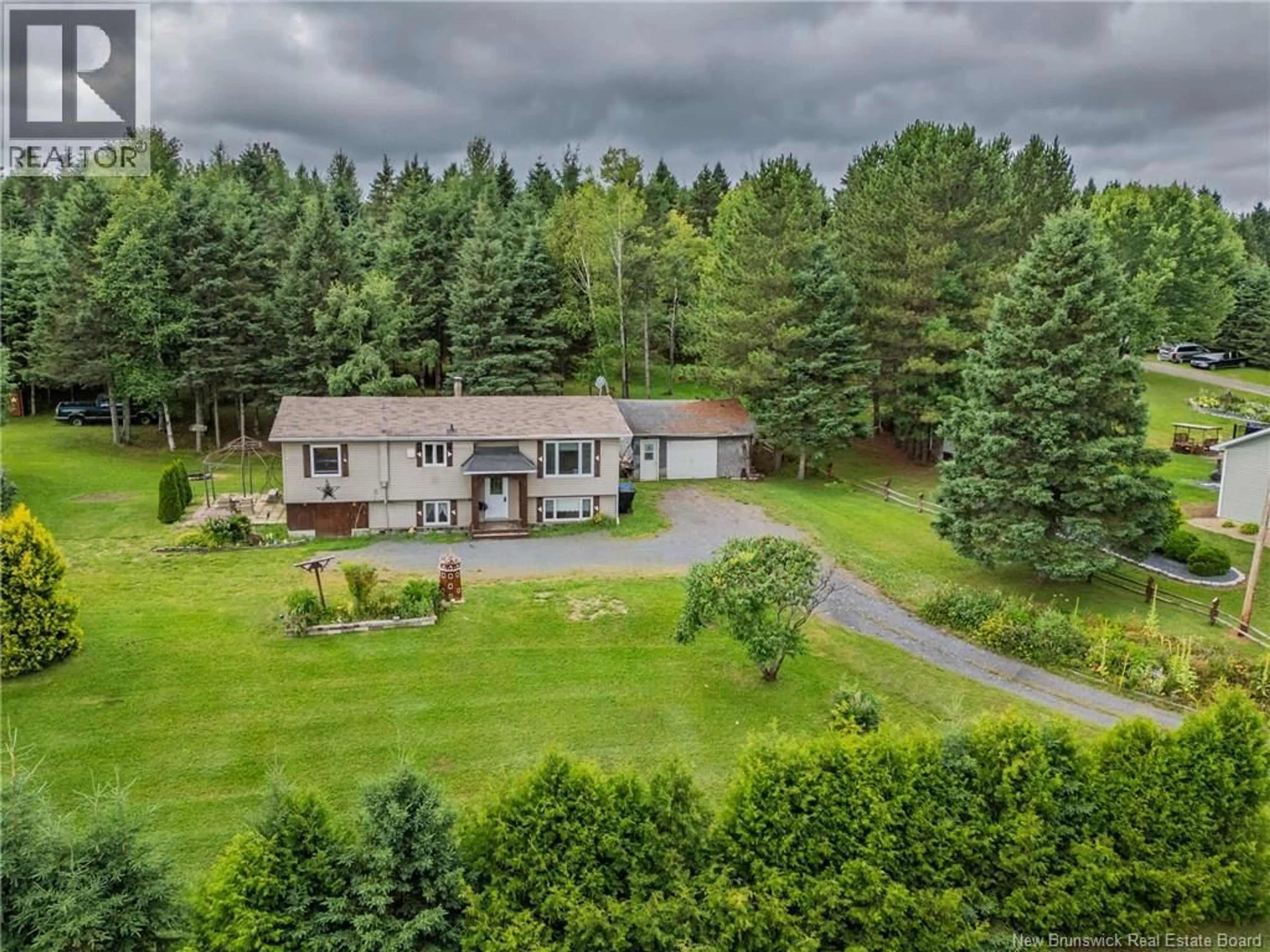 A pic from outside/outdoor area/front of a property/back of a property/a pic from drone, forest/trees view for 157 COTE MILL ROAD, DSL de Drummond/DSL of Drummond New Brunswick E3Y1N5