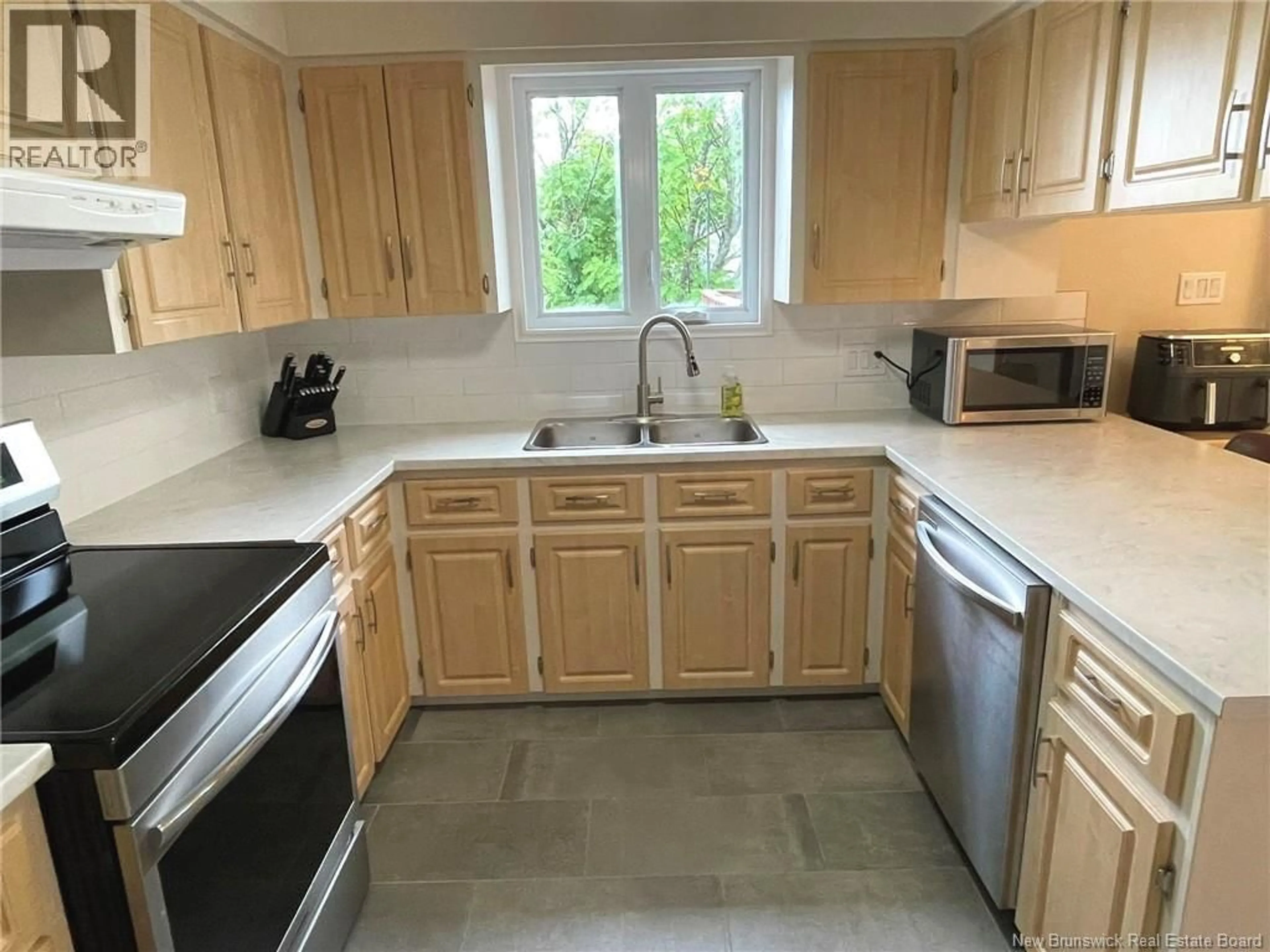 Standard kitchen, ceramic/tile floor for 4 EMILE-SIMARD AVENUE, Edmundston New Brunswick E3V3P9