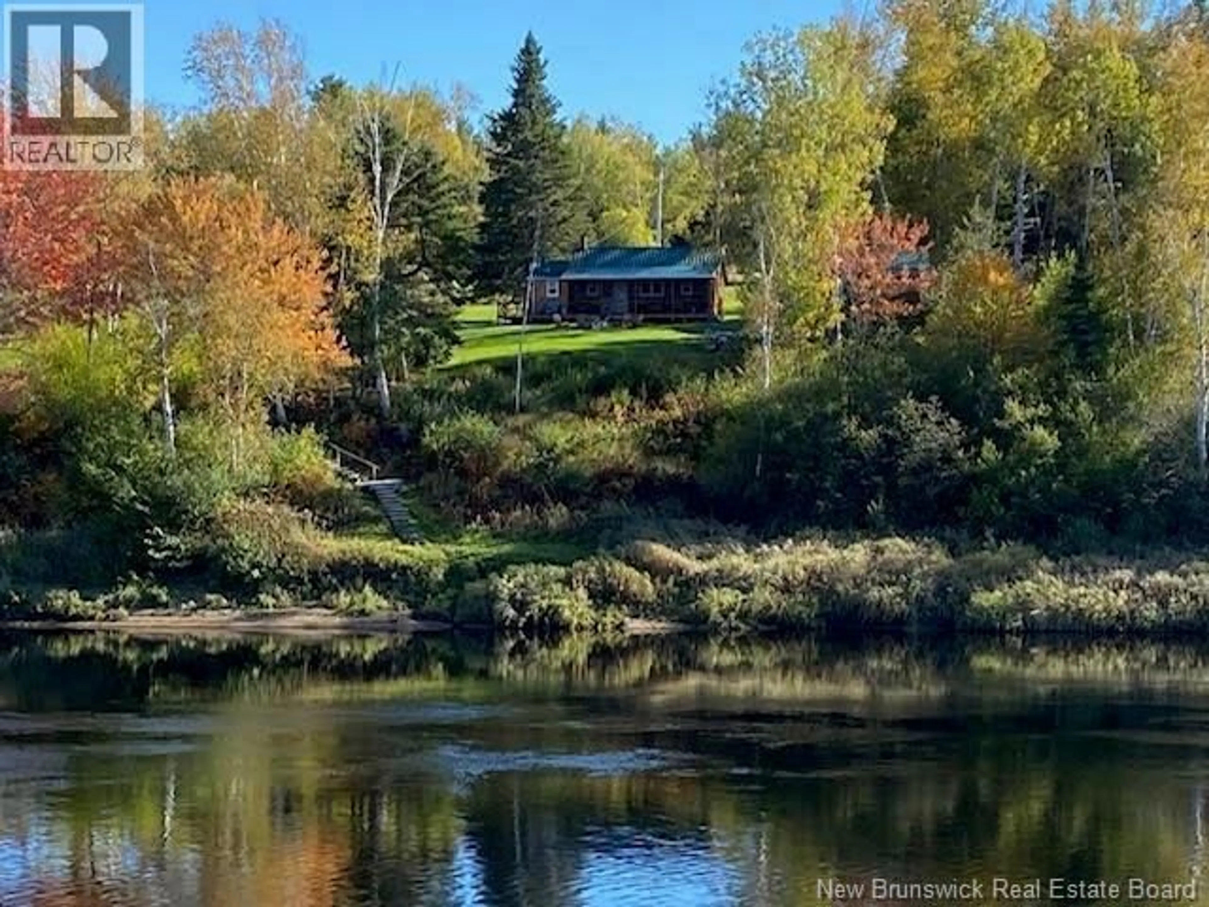 A pic from outside/outdoor area/front of a property/back of a property/a pic from drone, water/lake/river/ocean view for 475 ROUTE 118, Gray Rapids New Brunswick E4G2B2