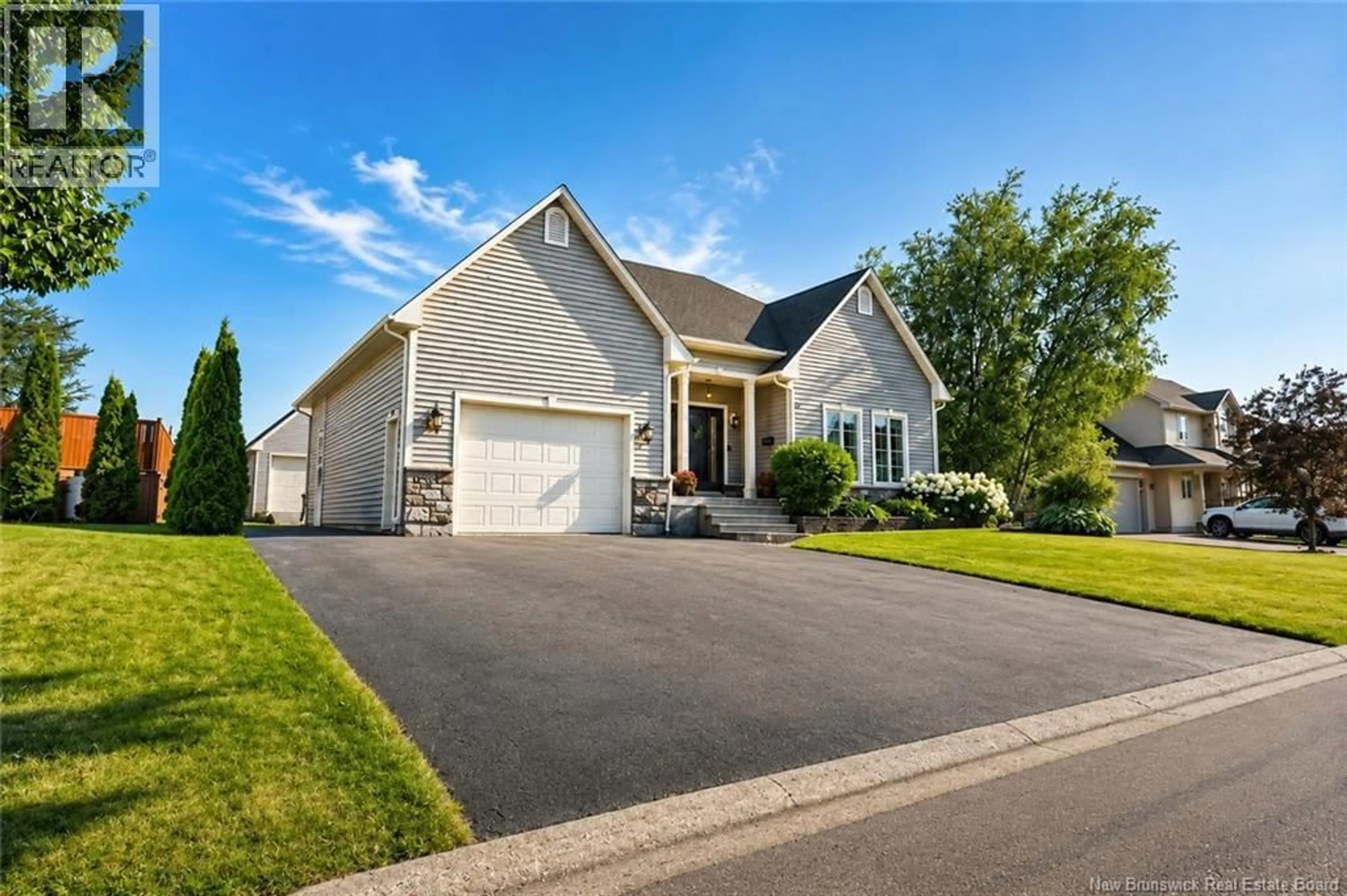 Home with vinyl exterior material, street for 36 RUE JEAN-CHARLES STREET, Dieppe New Brunswick E1A0K6