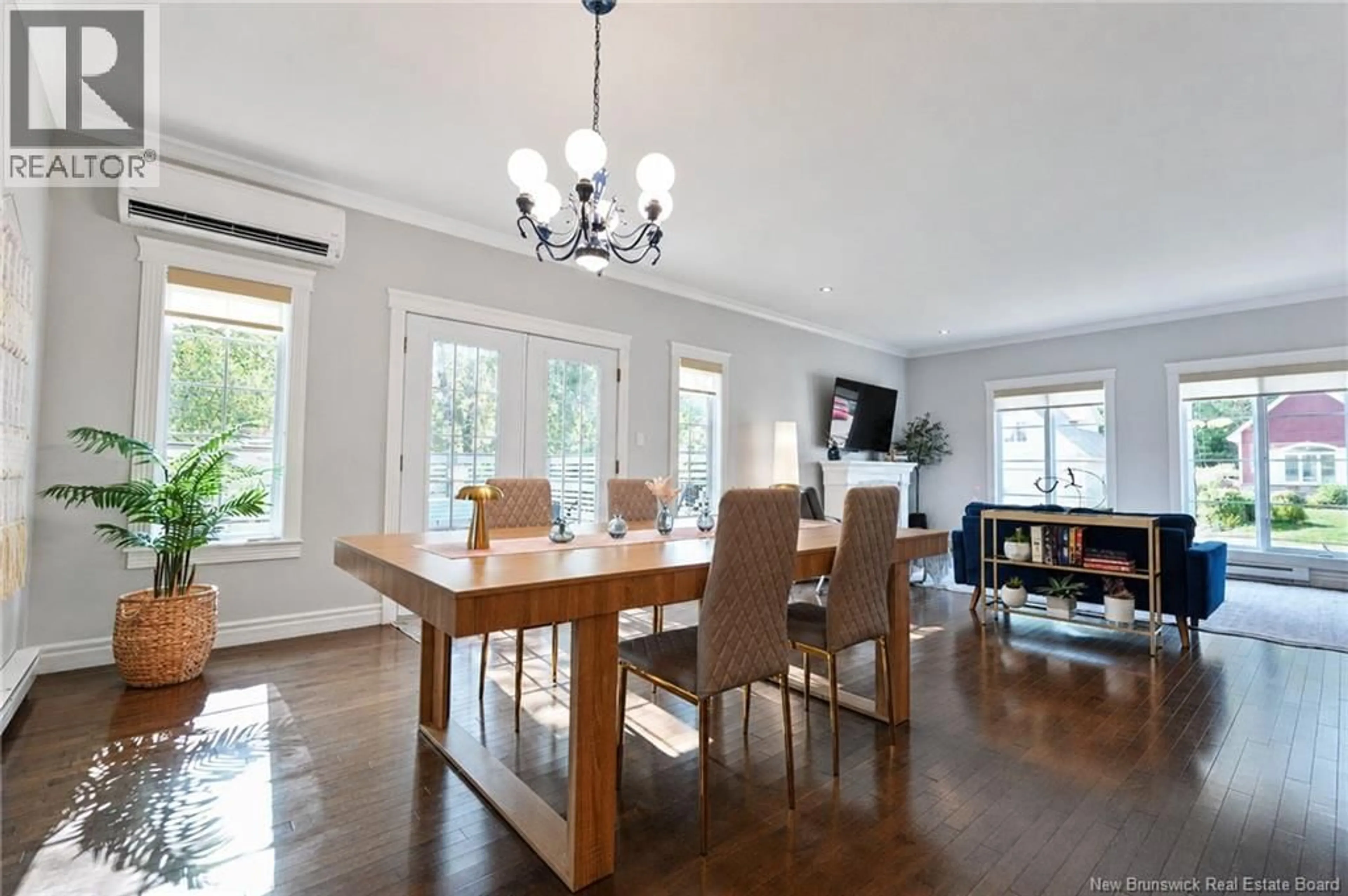 Dining room, wood/laminate floor for 36 RUE JEAN-CHARLES STREET, Dieppe New Brunswick E1A0K6