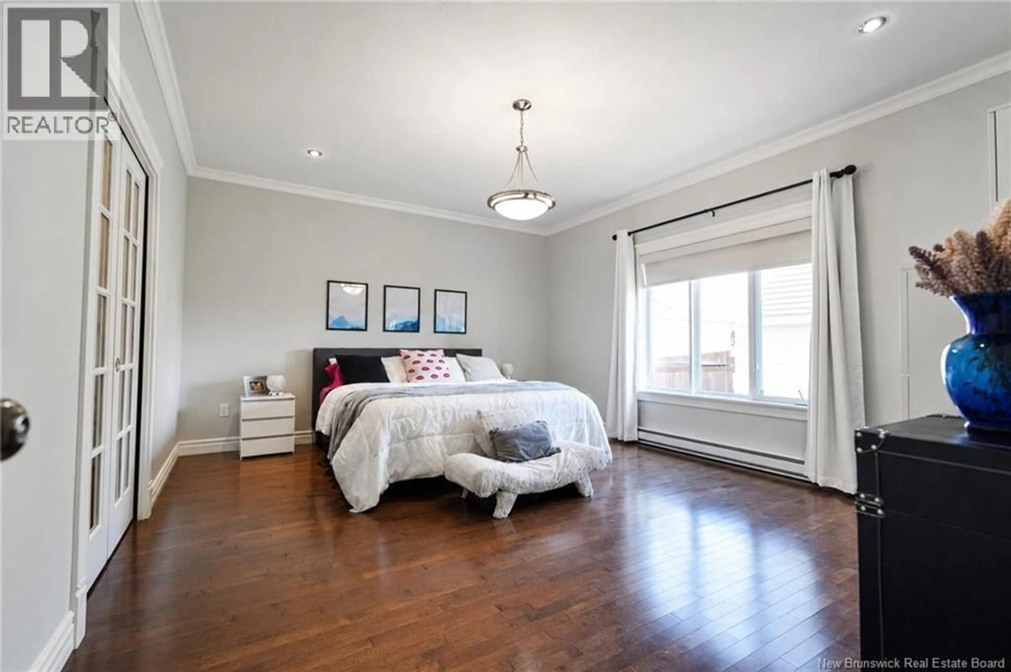 Bedroom with bed, wood/laminate floor for 36 RUE JEAN-CHARLES STREET, Dieppe New Brunswick E1A0K6