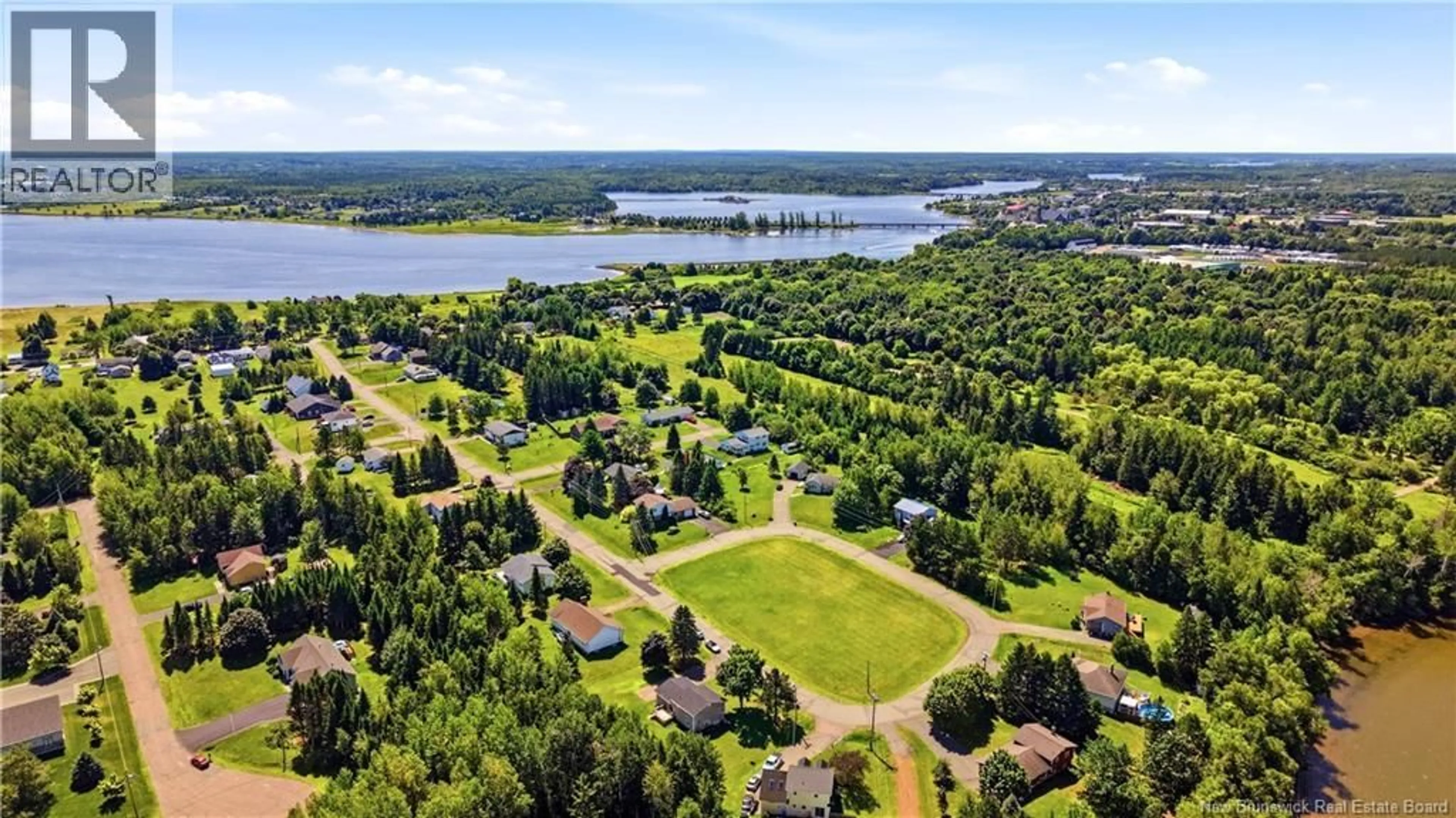 A pic from outside/outdoor area/front of a property/back of a property/a pic from drone, water/lake/river/ocean view for 35 RUE DES ROCHES, Bouctouche New Brunswick E4S3B4