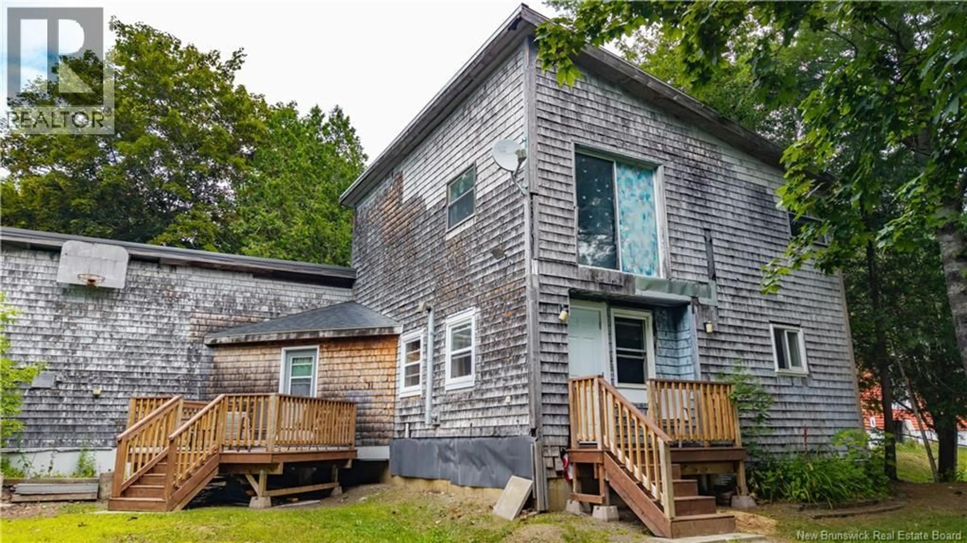 A pic from outside/outdoor area/front of a property/back of a property/a pic from drone, building for 6 PARKWOOD DRIVE, St. Stephen New Brunswick E3L2W2
