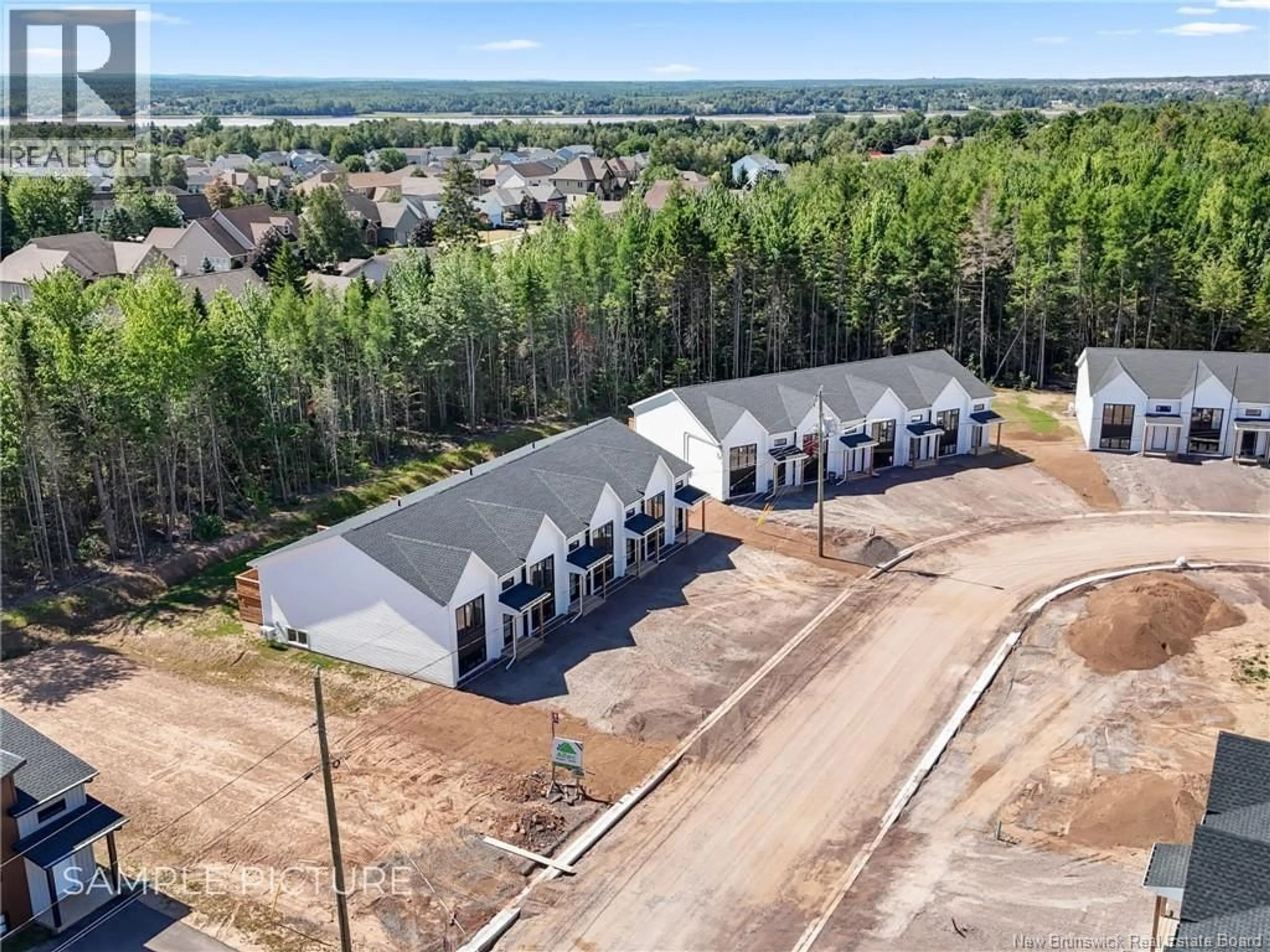A pic from outside/outdoor area/front of a property/back of a property/a pic from drone, unknown for 108 BEAU DOMAINE STREET, Dieppe New Brunswick E1A9H5